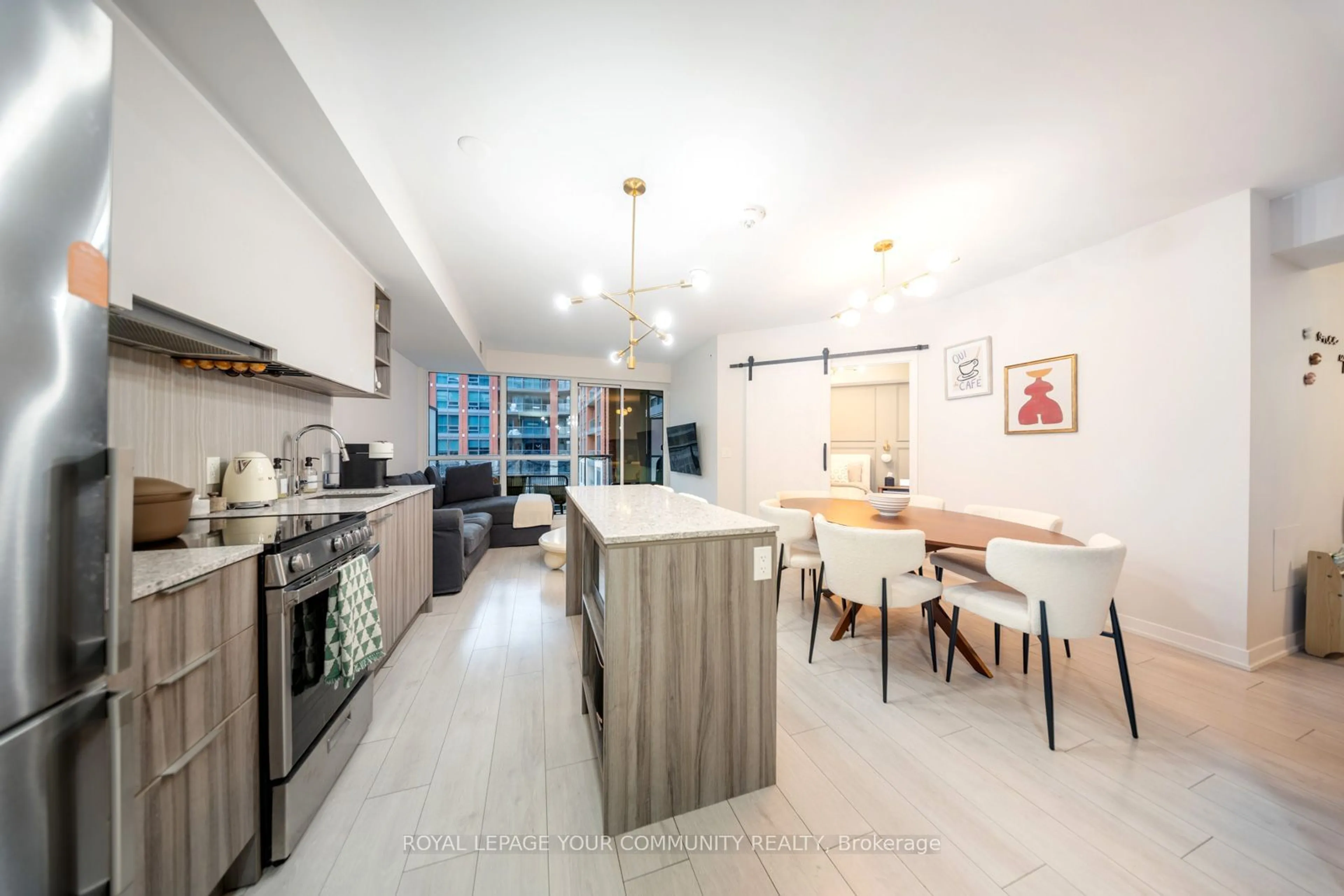 Open concept kitchen, ceramic/tile floor for 31 Tippett Rd #312, Toronto Ontario M3H 0C8