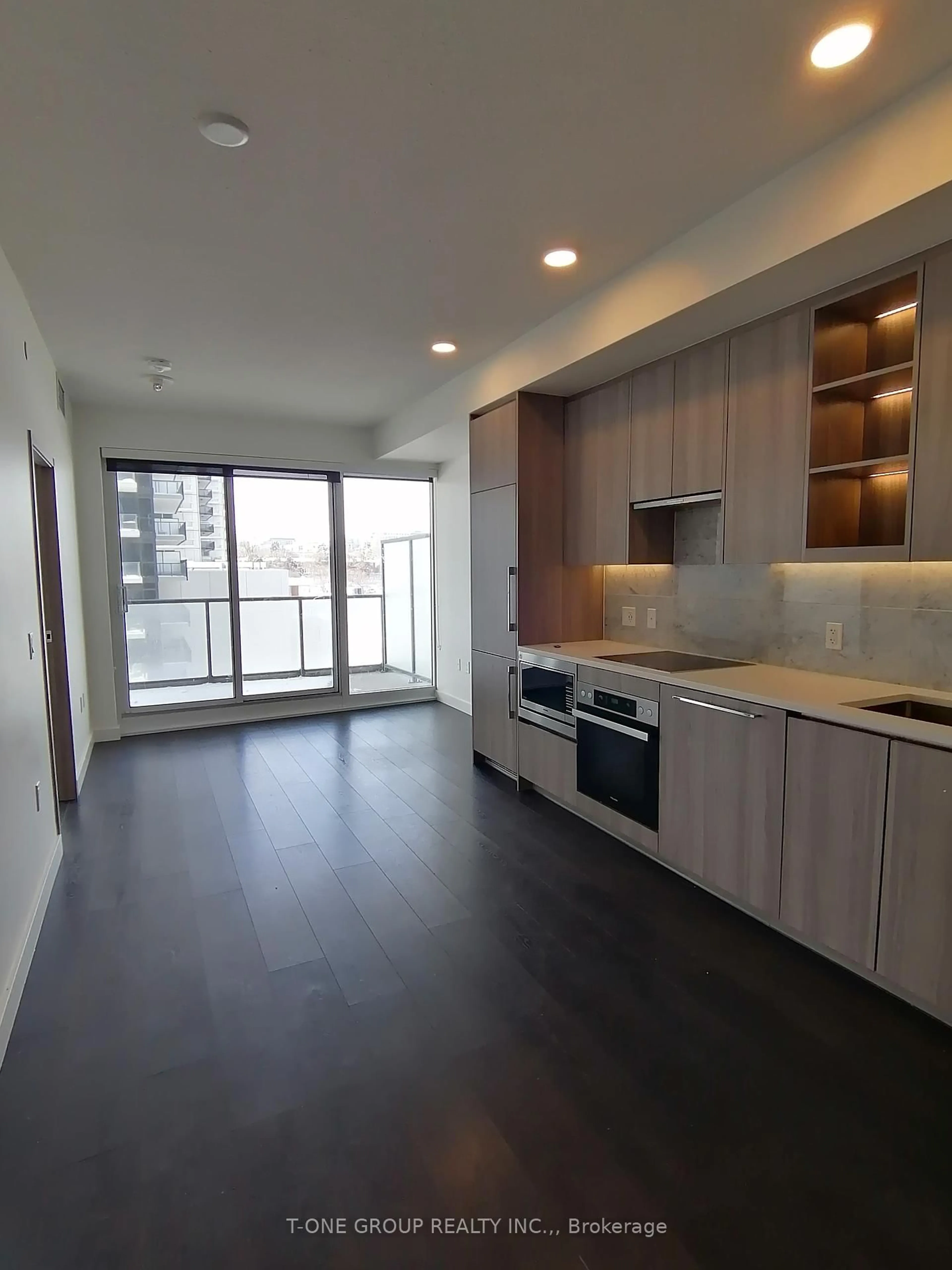 Open concept kitchen, wood/laminate floor for 95 Mcmahon Dr #707, Toronto Ontario M2K 0H1