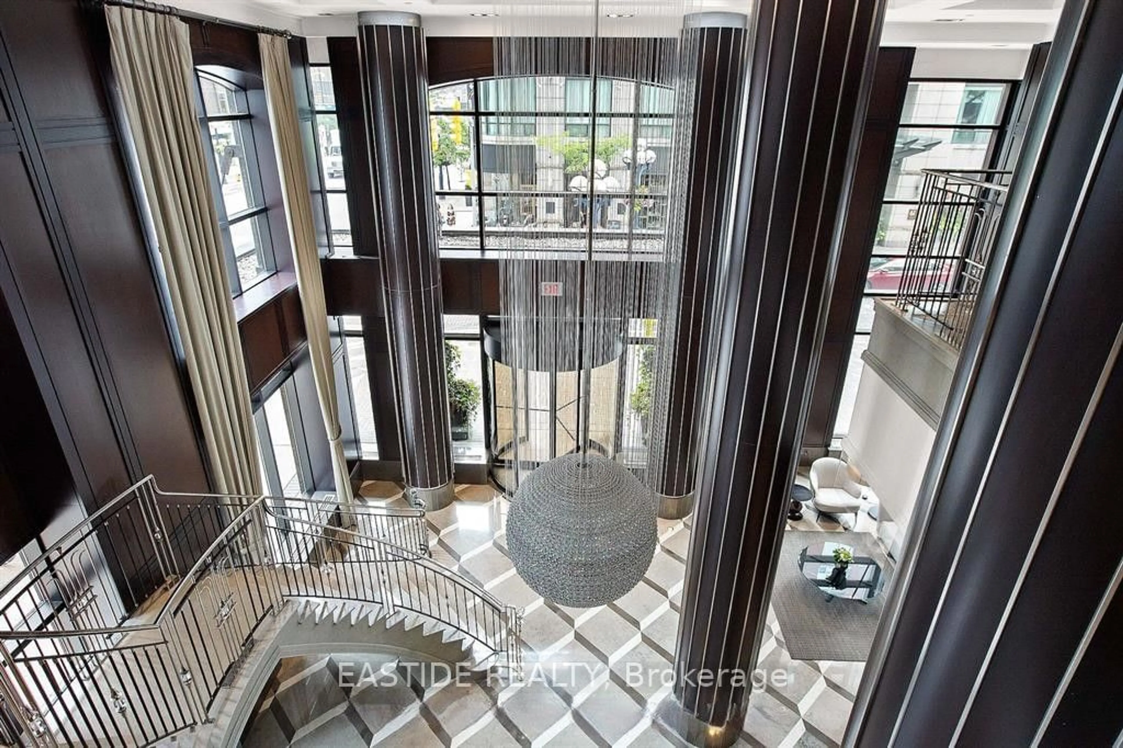 Indoor foyer for 68 Yorkville Ave #303, Toronto Ontario M5R 3V7