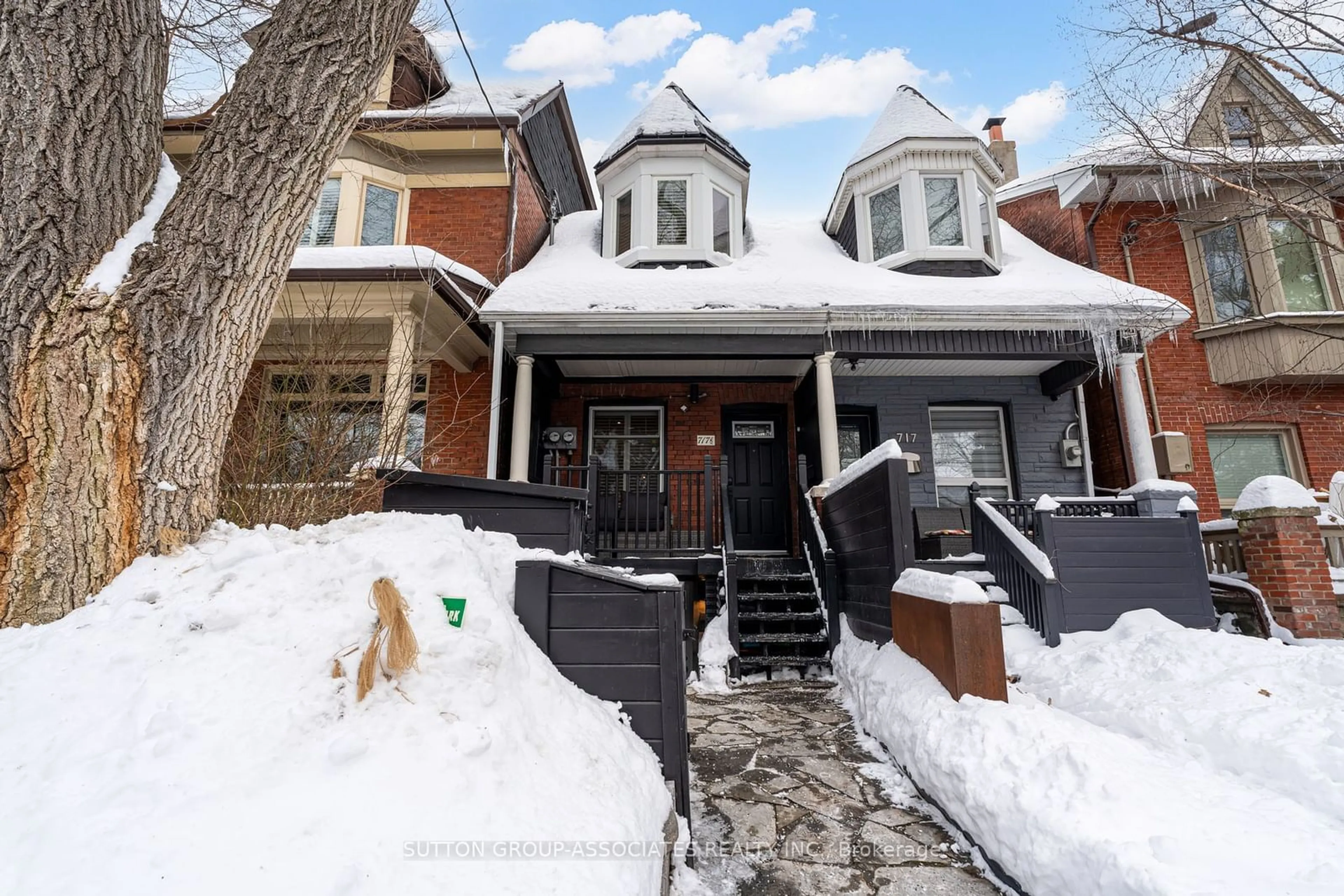 Home with brick exterior material, street for 717 1/2 Palmerston Ave, Toronto Ontario M6G 2R2