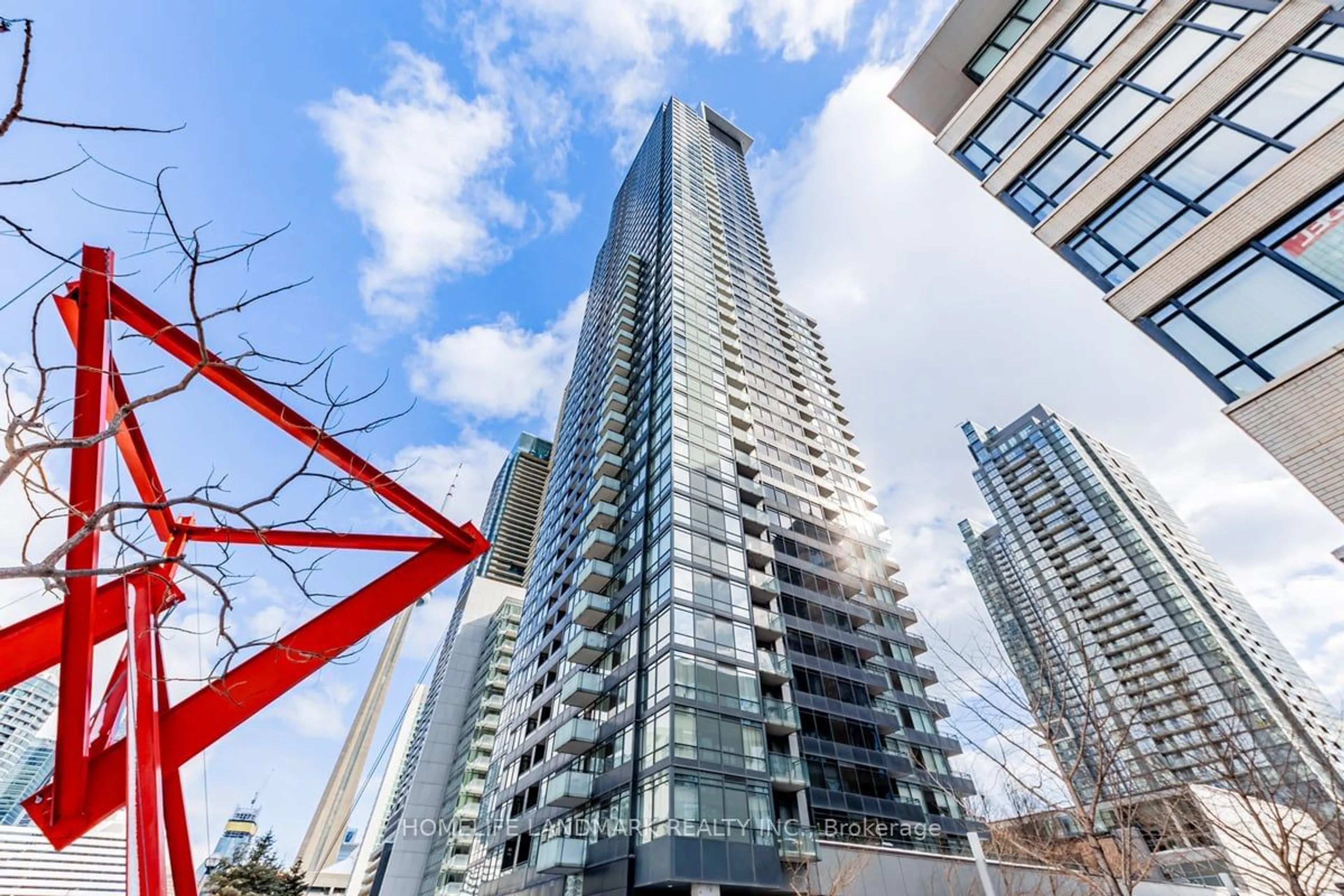 A pic from outside/outdoor area/front of a property/back of a property/a pic from drone, city buildings view from balcony for 25 Telegram Mews #215, Toronto Ontario M5V 3Z1