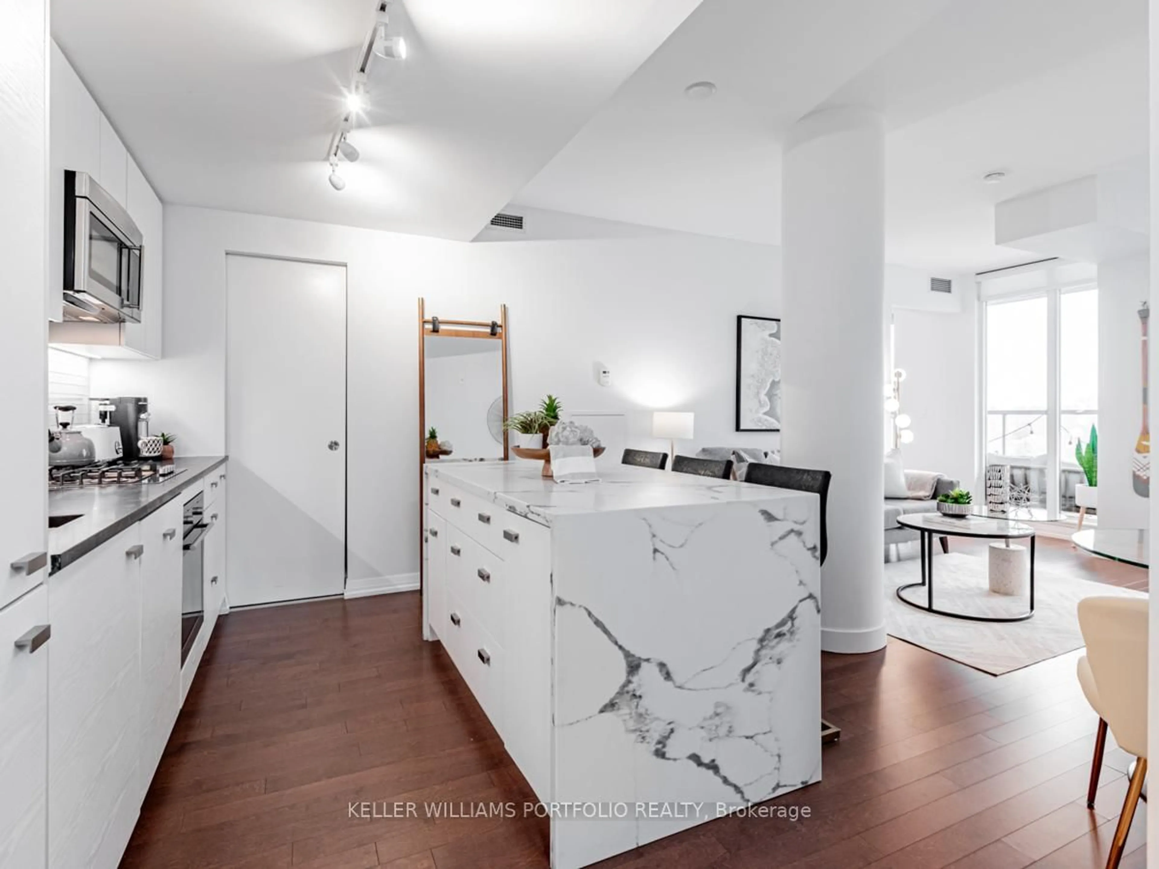 Open concept kitchen, ceramic/tile floor for 835 St. Clair Ave #601, Toronto Ontario M6C 1C2