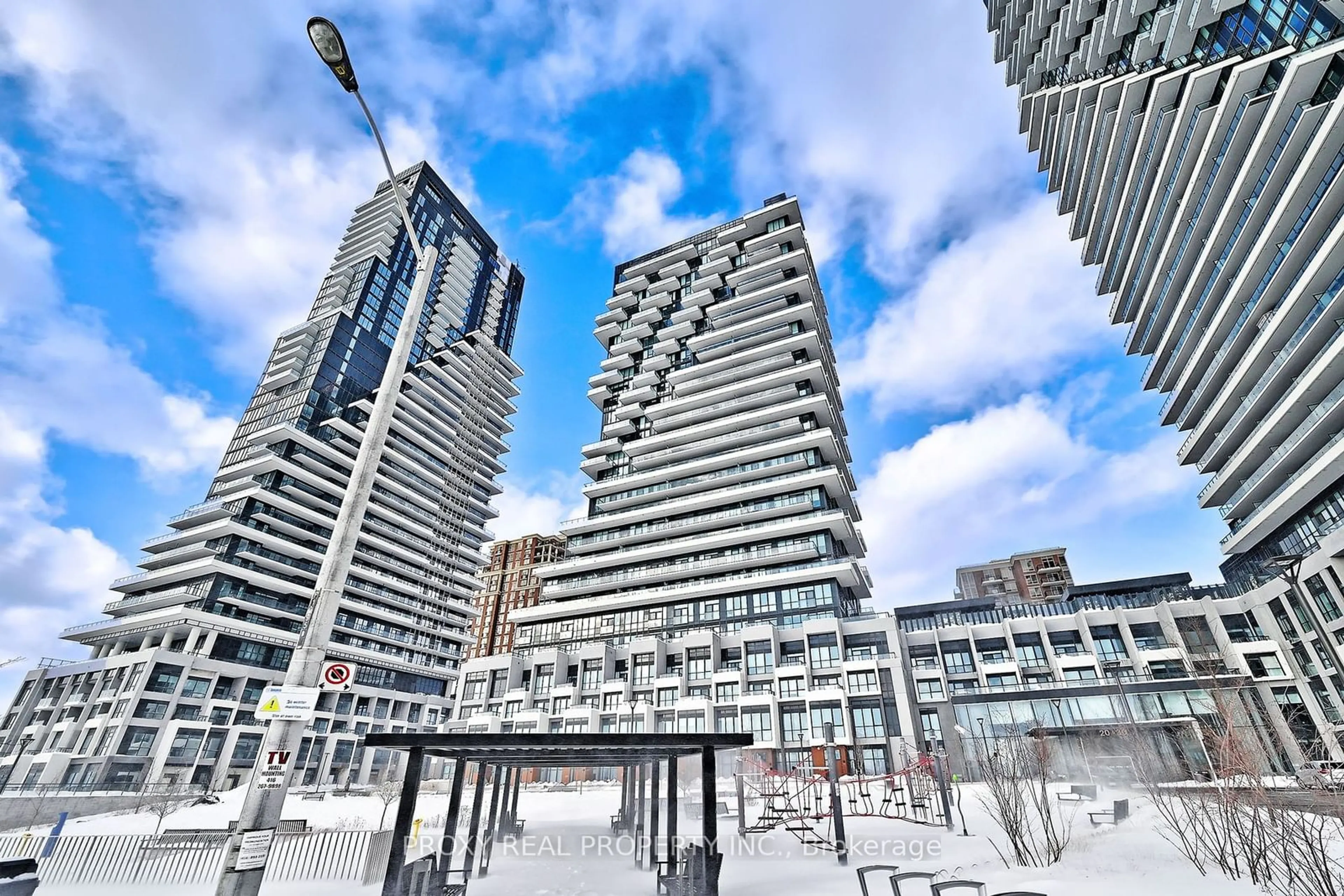 Patio, city buildings view from balcony for 20 Inn On The Park Dr #833, Toronto Ontario M3C 0P8