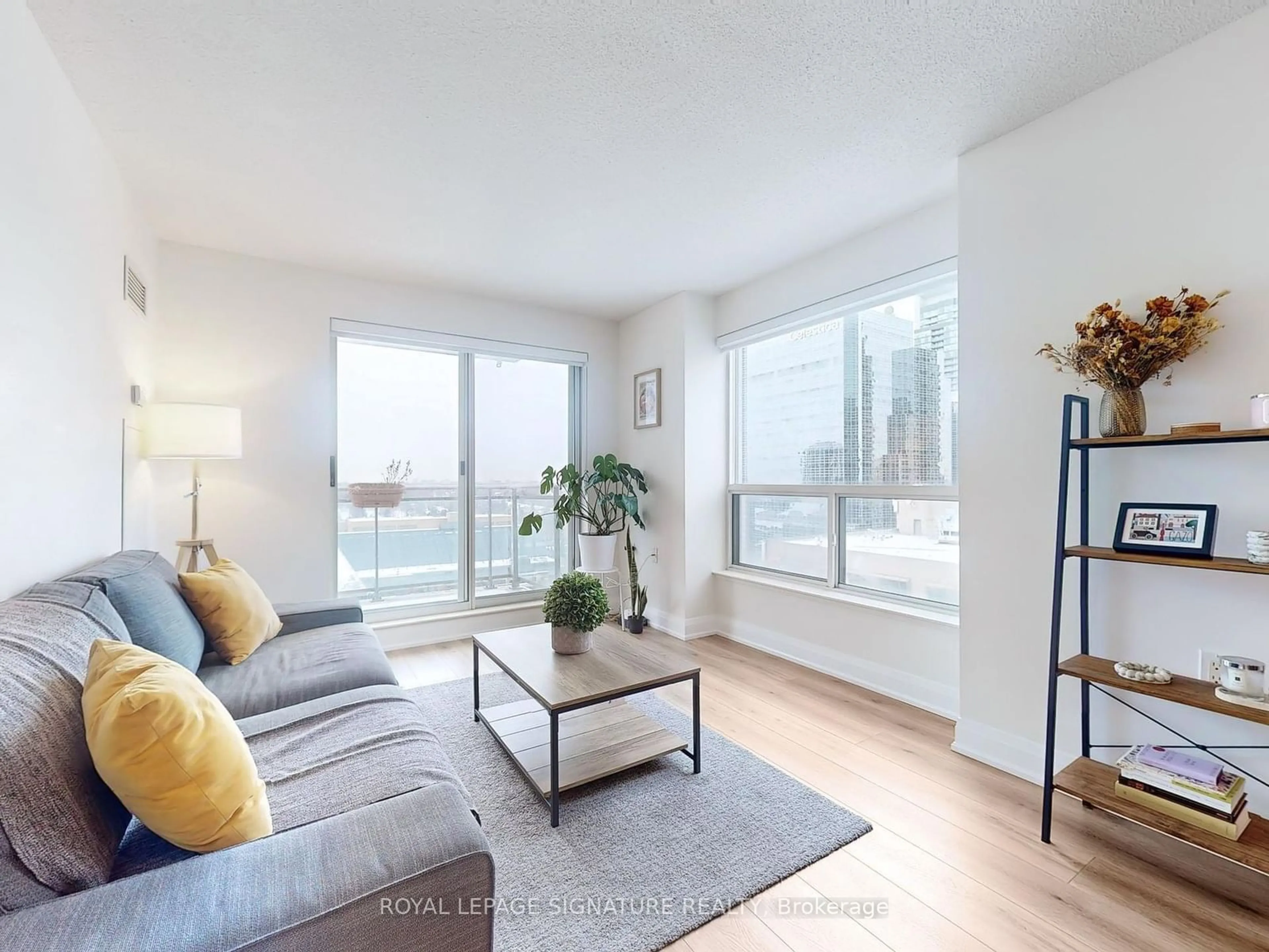 Living room with furniture, wood/laminate floor for 21 Hillcrest Ave #1807, Toronto Ontario M2N 7K2