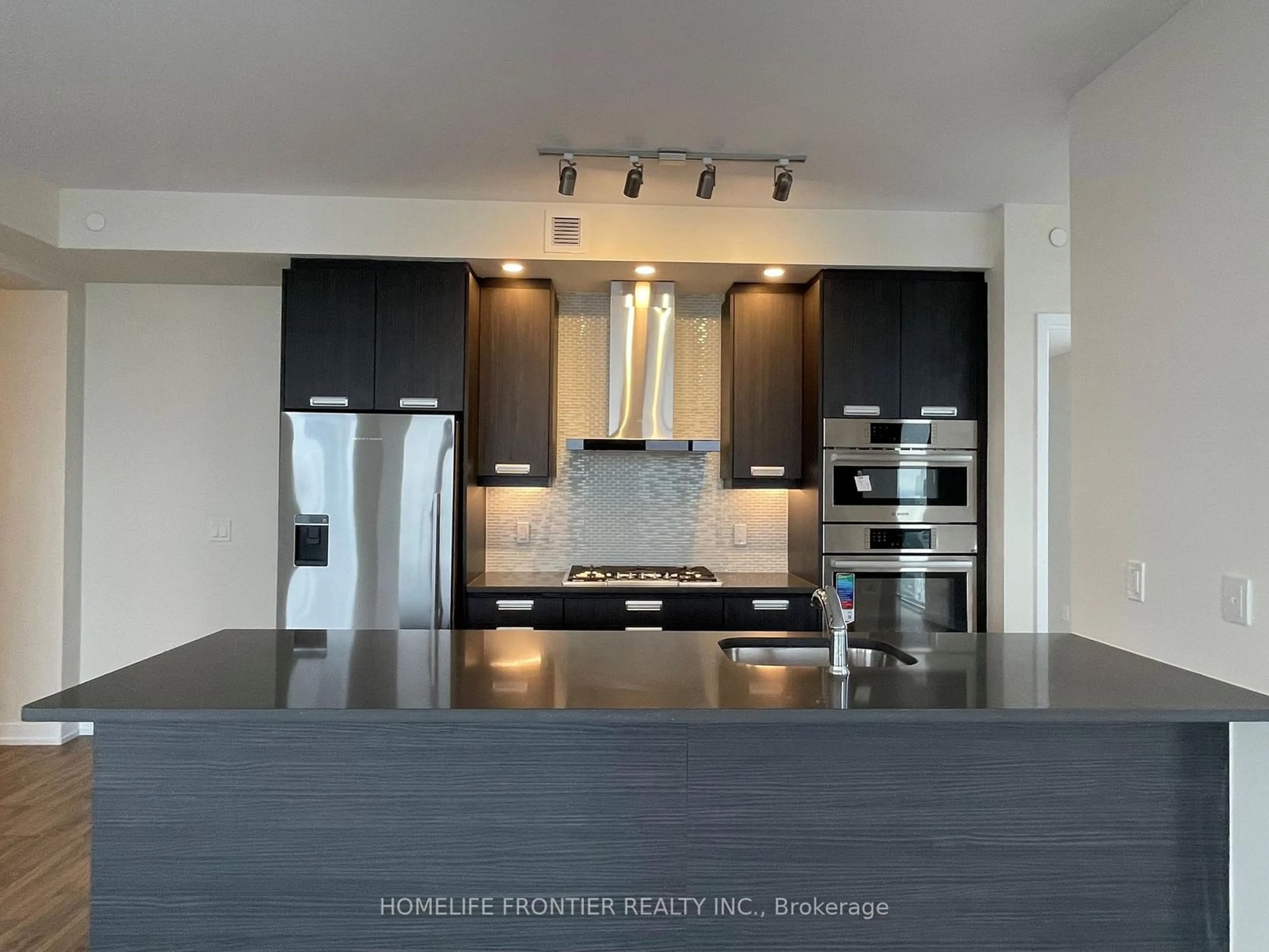 Open concept kitchen, ceramic/tile floor for 99 John St #4204, Toronto Ontario M5V 0S6