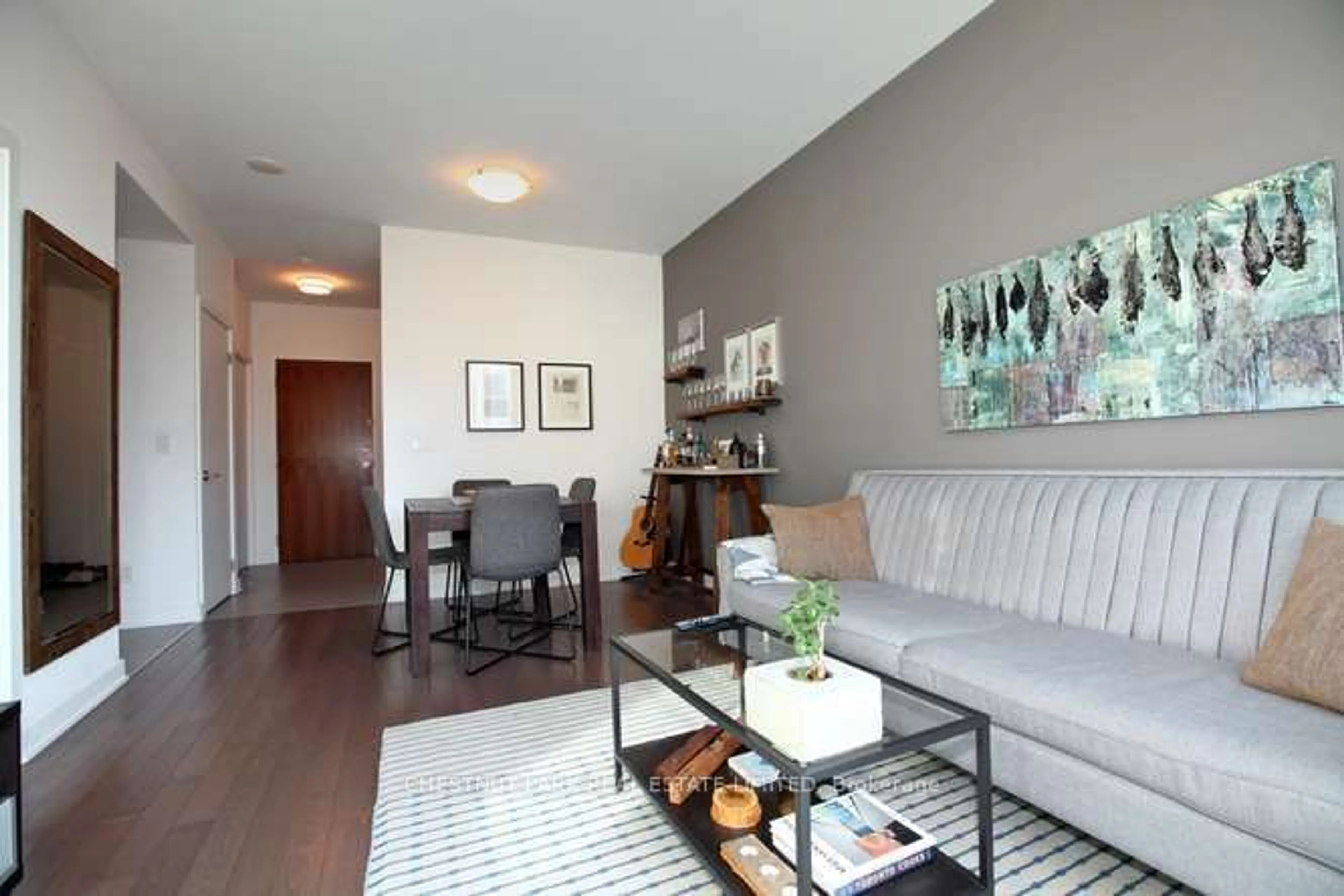 Living room with furniture, wood/laminate floor for 3 Market St #421, Toronto Ontario M5E 0A3