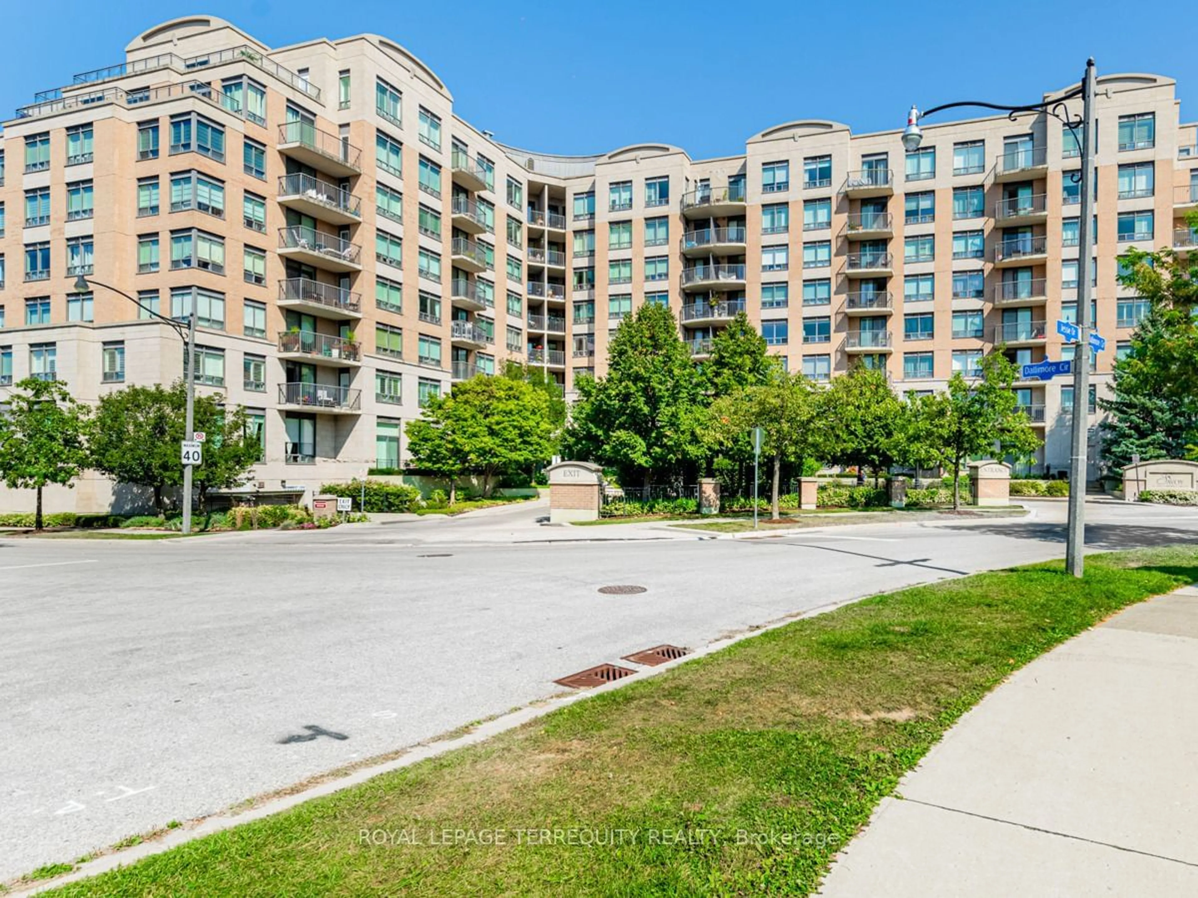 A pic from outside/outdoor area/front of a property/back of a property/a pic from drone, street for 16 Dallimore Circ #113, Toronto Ontario M3C 4C4