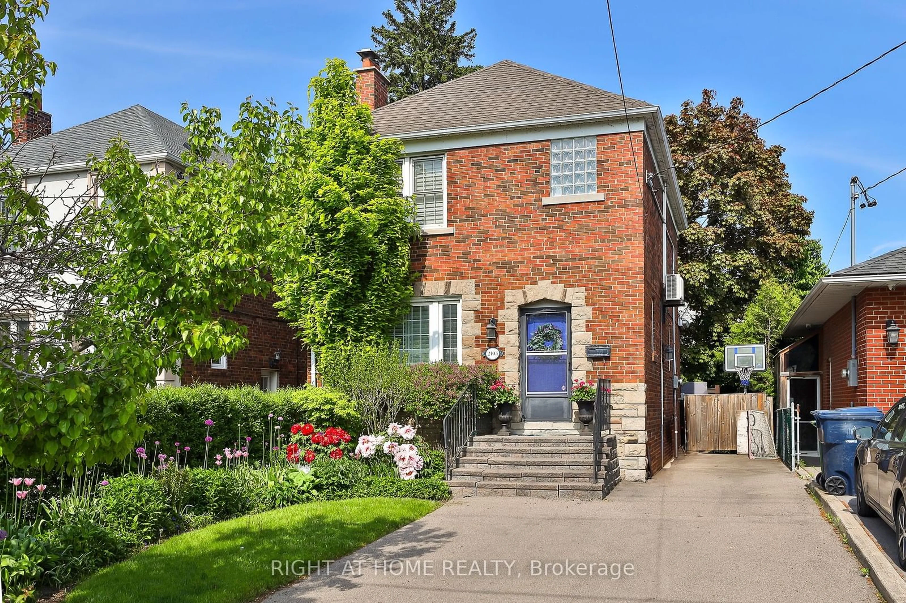 Home with brick exterior material, street for 2103 Avenue Rd, Toronto Ontario M5M 4A9