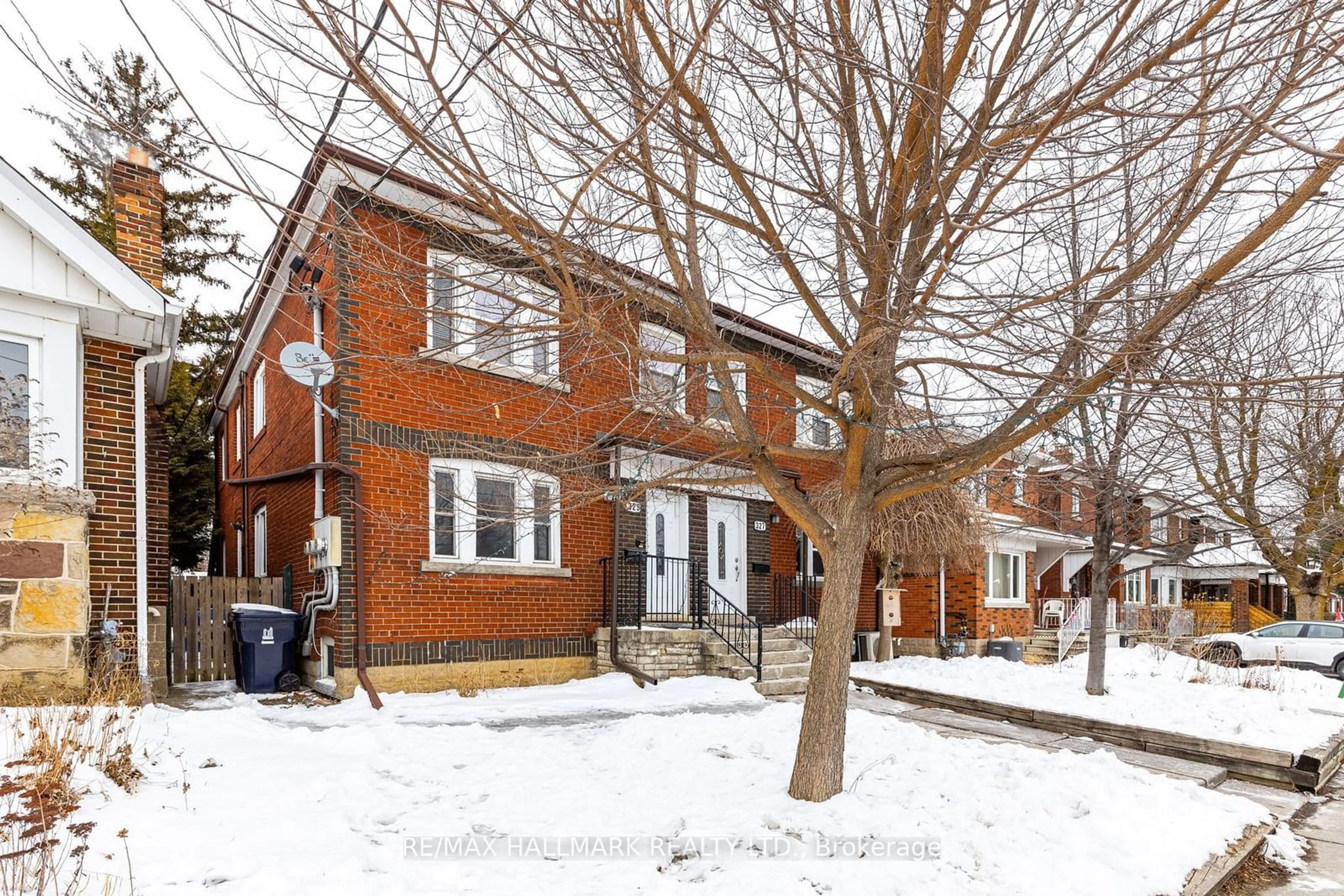 Home with brick exterior material, street for 329 Vaughan Rd, Toronto Ontario M6C 2N5