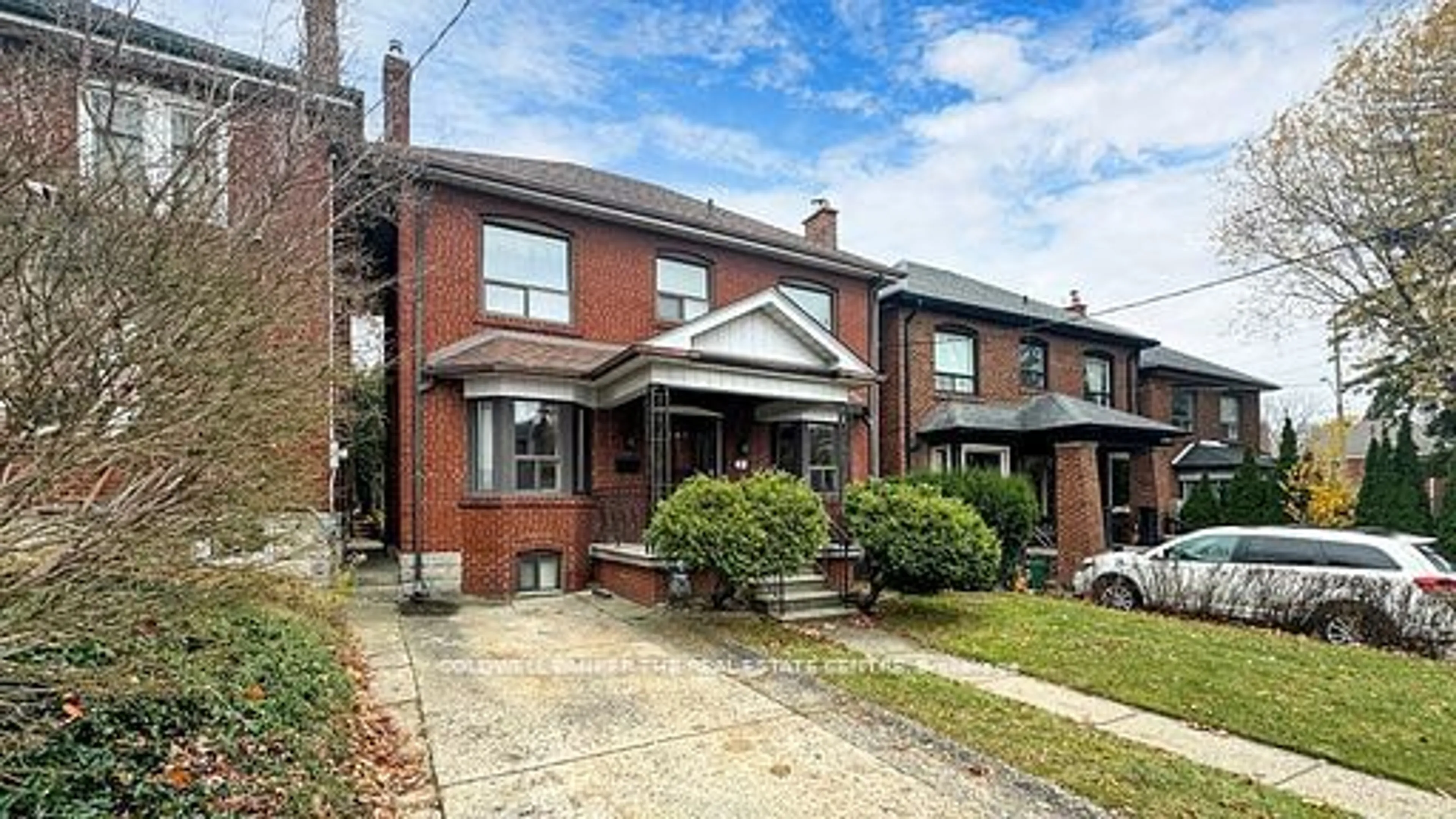 Home with brick exterior material, street for 261 Winona Dr, Toronto Ontario M6C 3S6