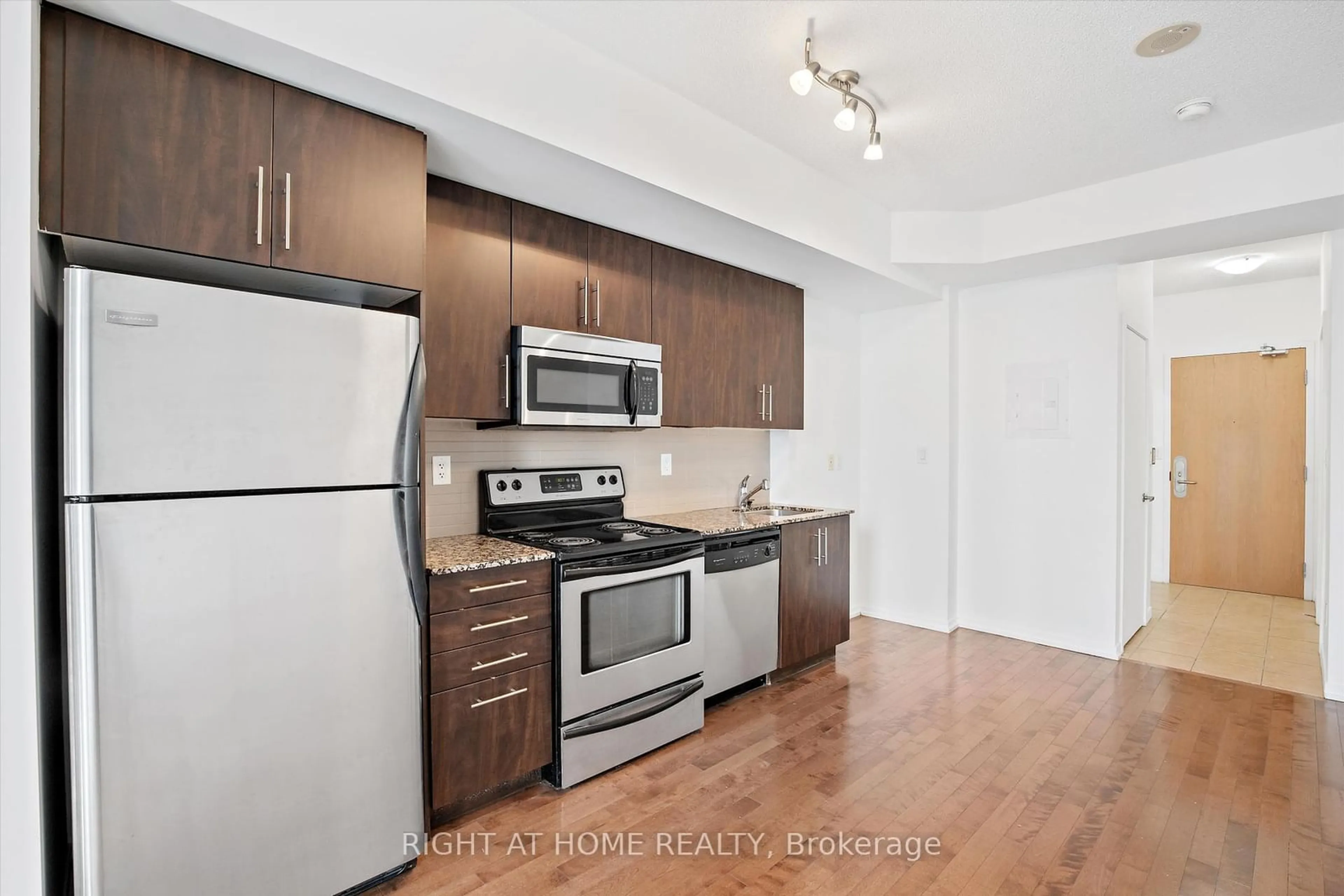 Standard kitchen, wood/laminate floor for 65 Bremner Blvd #2403, Toronto Ontario M5J 0A7