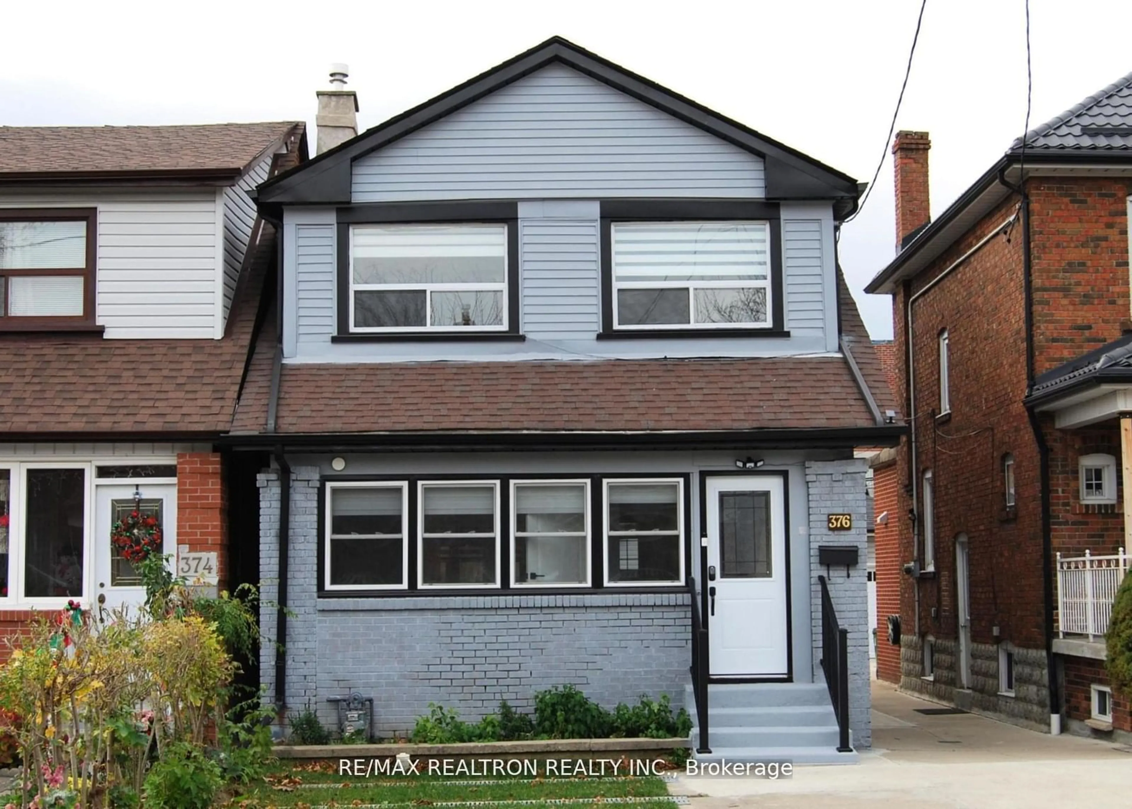 Home with brick exterior material, street for 376 Northcliffe Blvd, Toronto Ontario M6E 3L1