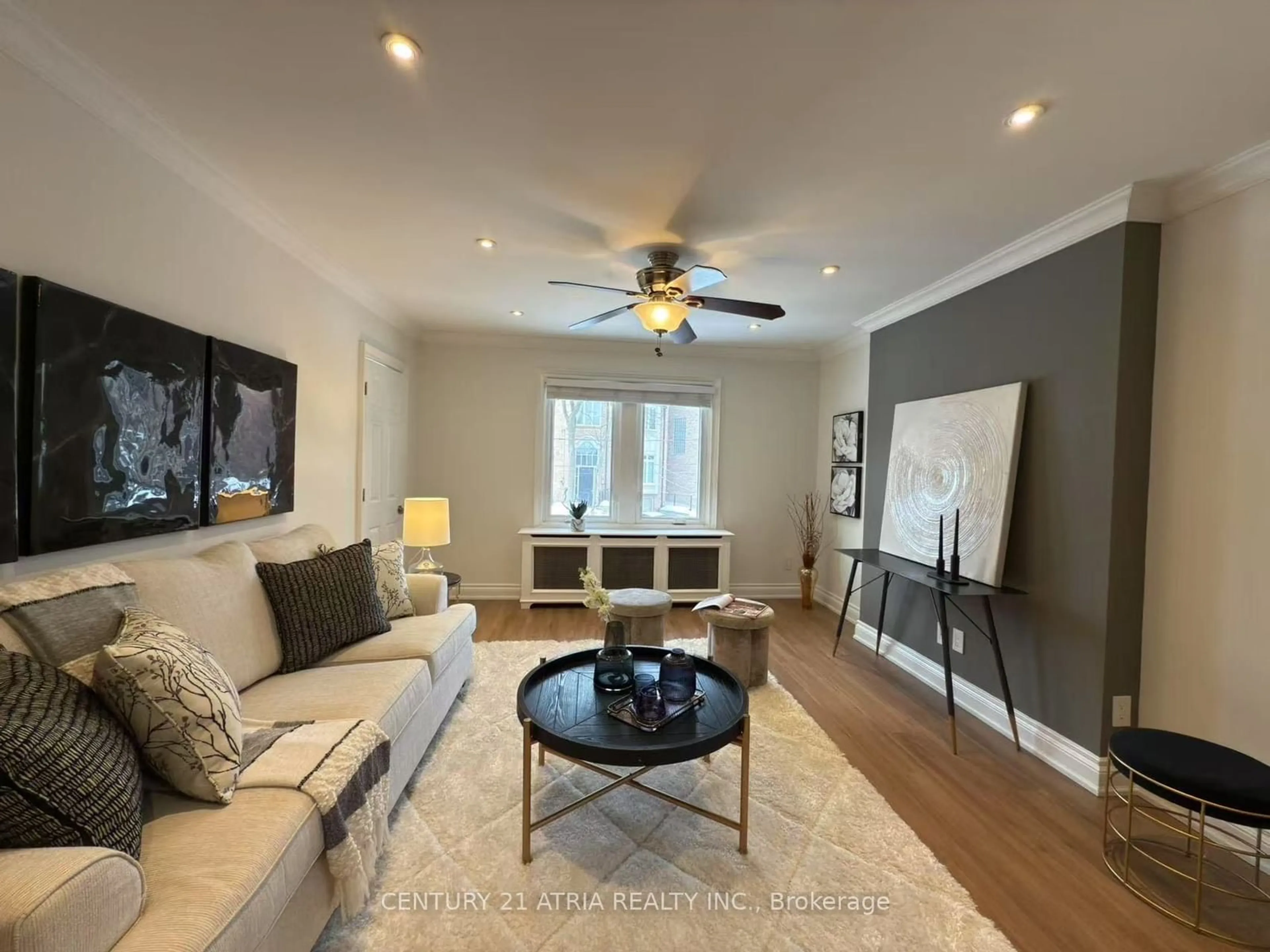 Living room with furniture, wood/laminate floor for 63 Burnaby Blvd, Toronto Ontario M5N 1G3