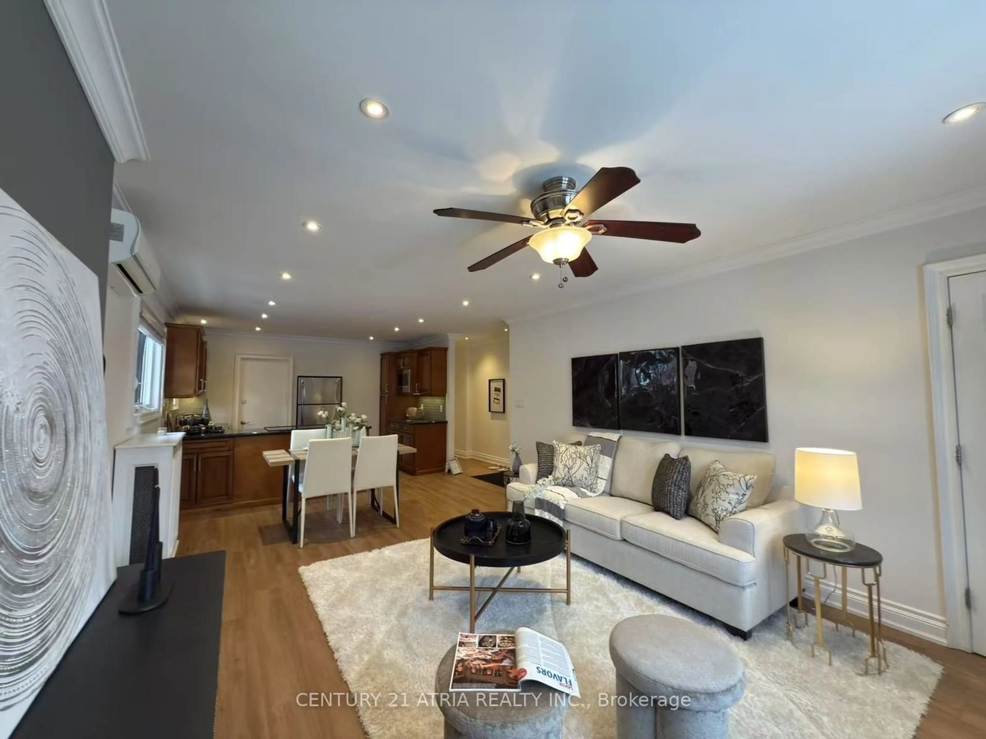 Living room with furniture, wood/laminate floor for 63 Burnaby Blvd, Toronto Ontario M5N 1G3