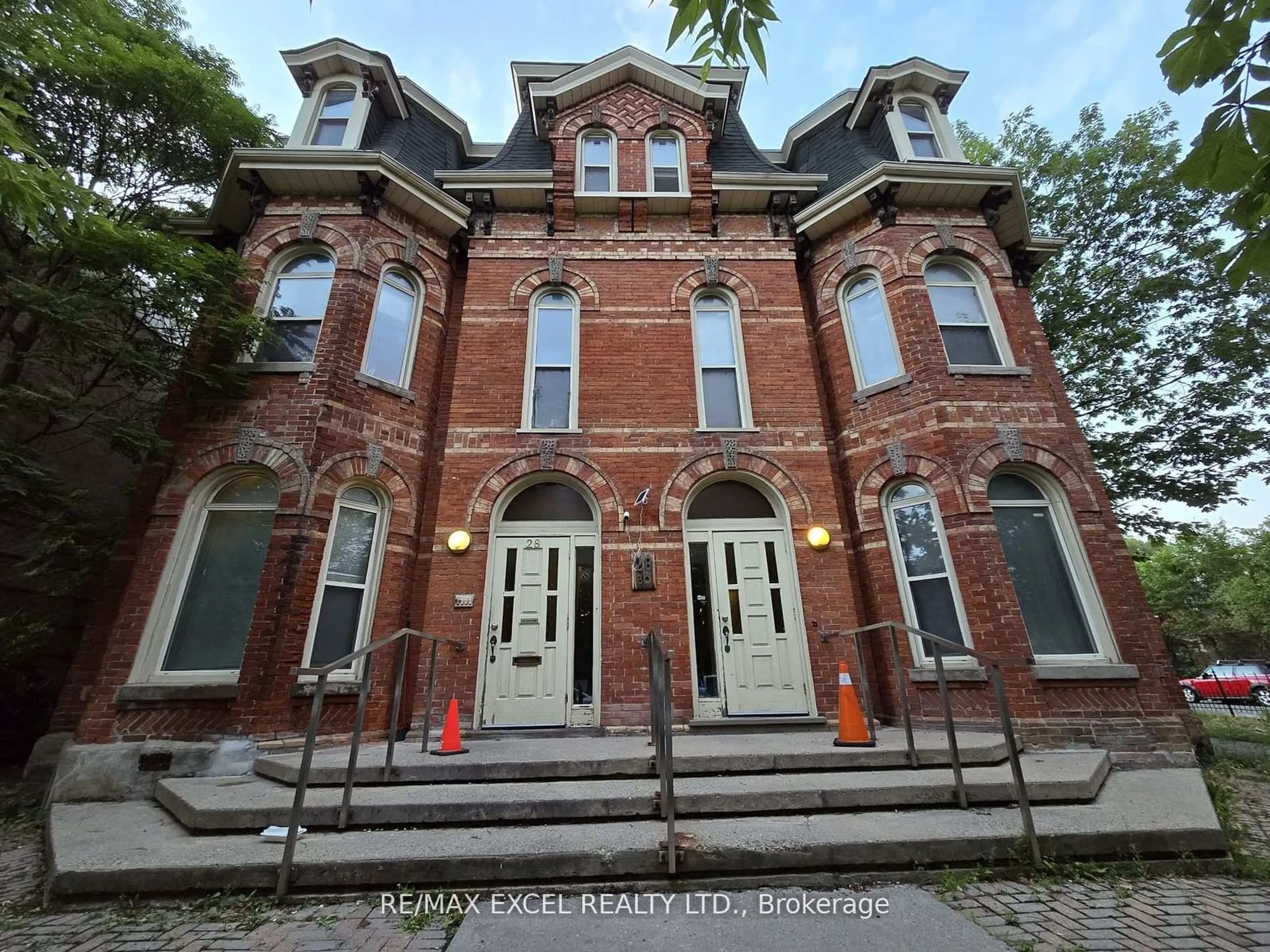 Home with brick exterior material, street for 28 Cecil St, Toronto Ontario M5T 1N3