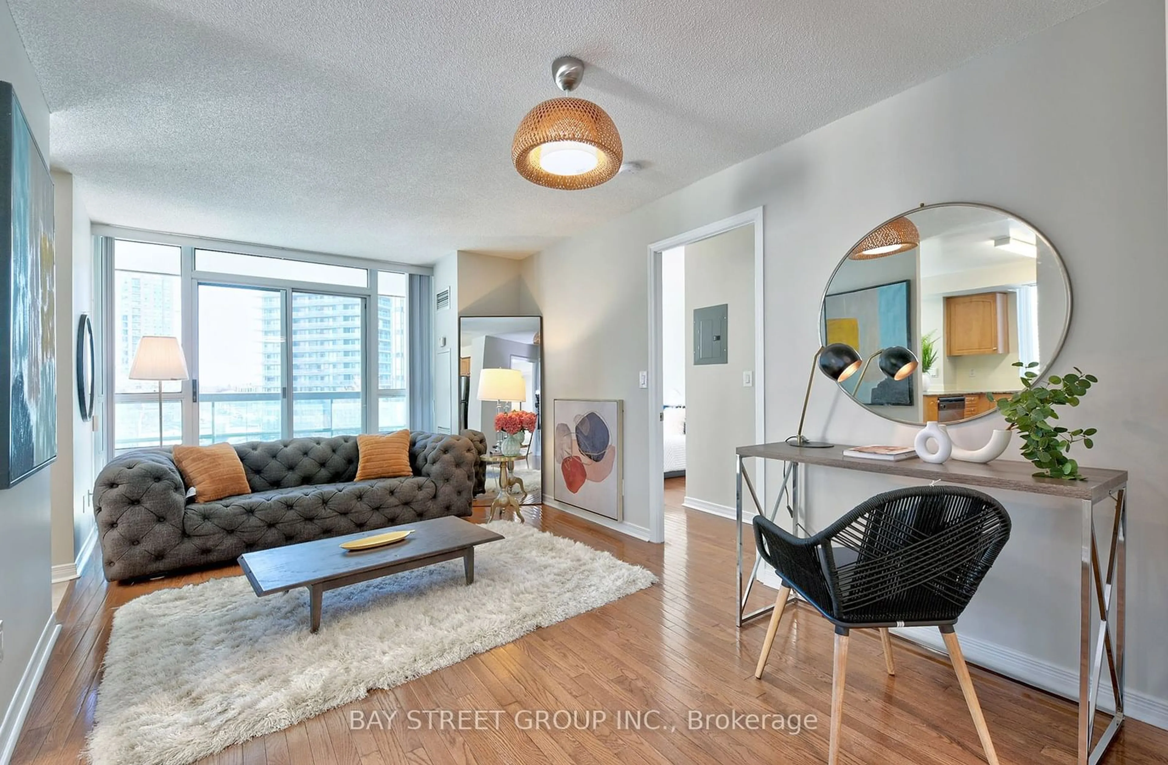 Living room with furniture, wood/laminate floor for 503 Beecroft Rd #616, Toronto Ontario M2N 0A2