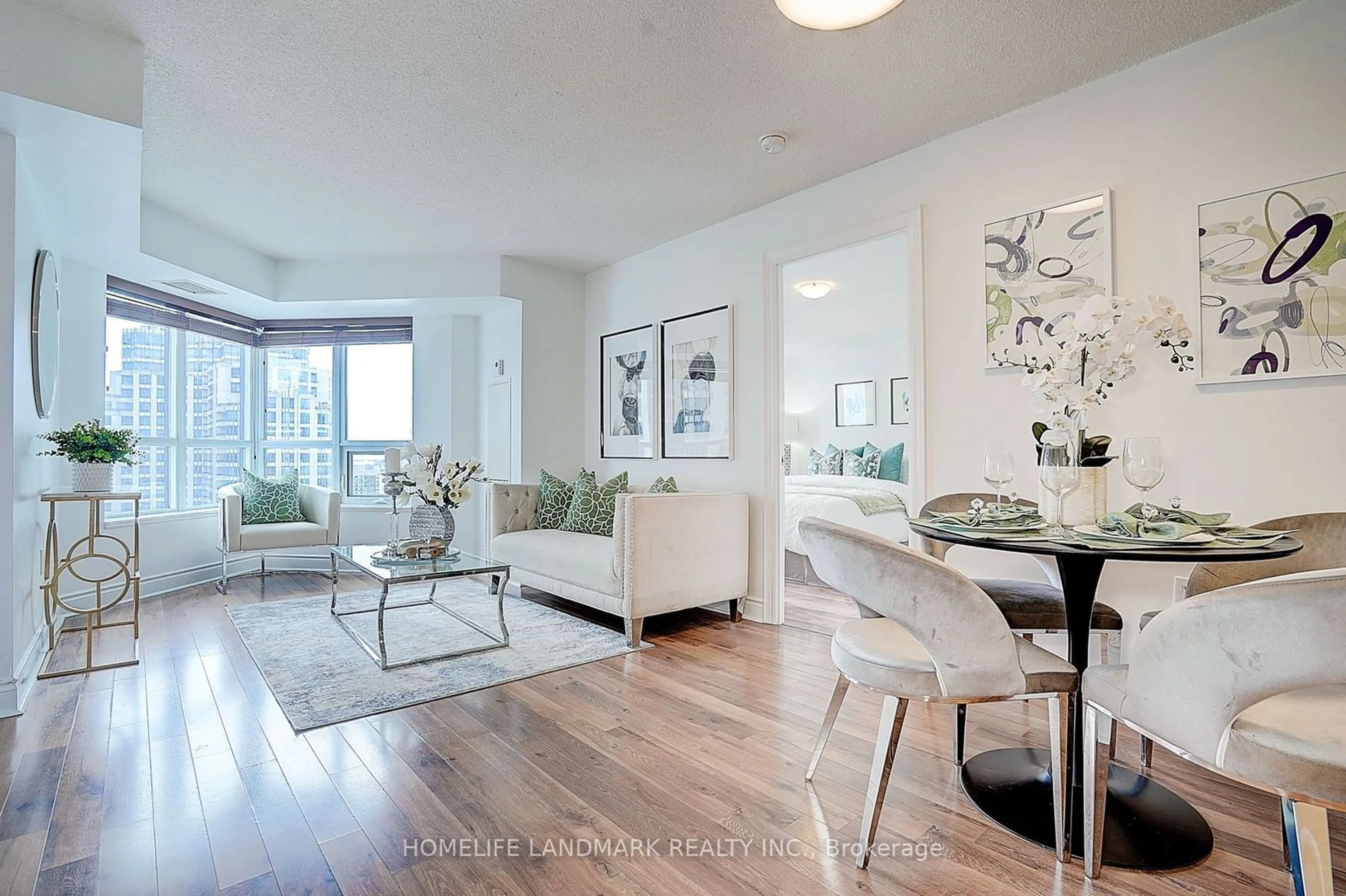 Living room with furniture, wood/laminate floor for 500 Doris Ave #1823, Toronto Ontario M2N 0C1