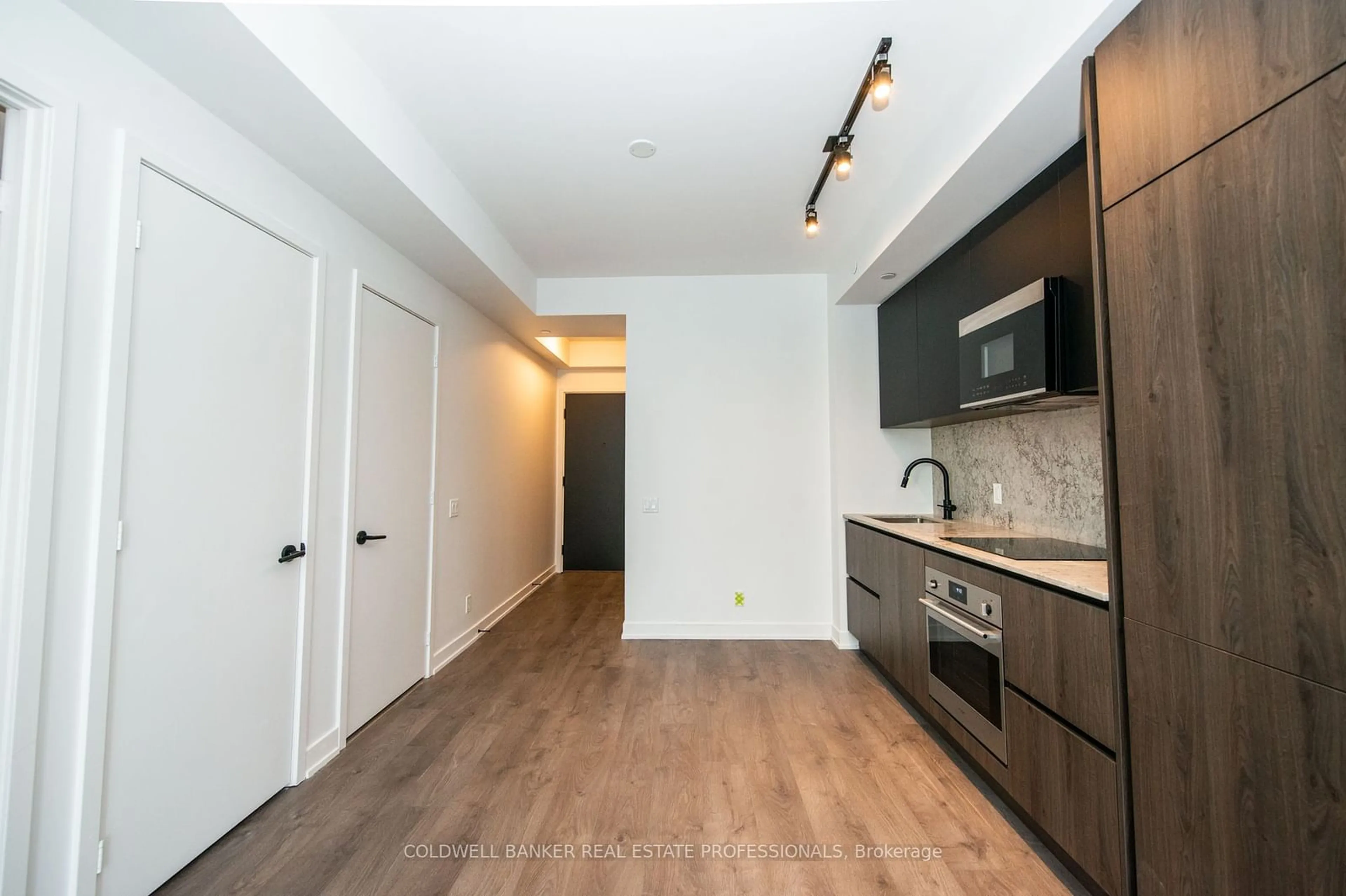 Standard kitchen, wood/laminate floor for 108 Peter St #2905, Toronto Ontario M5V 0W2