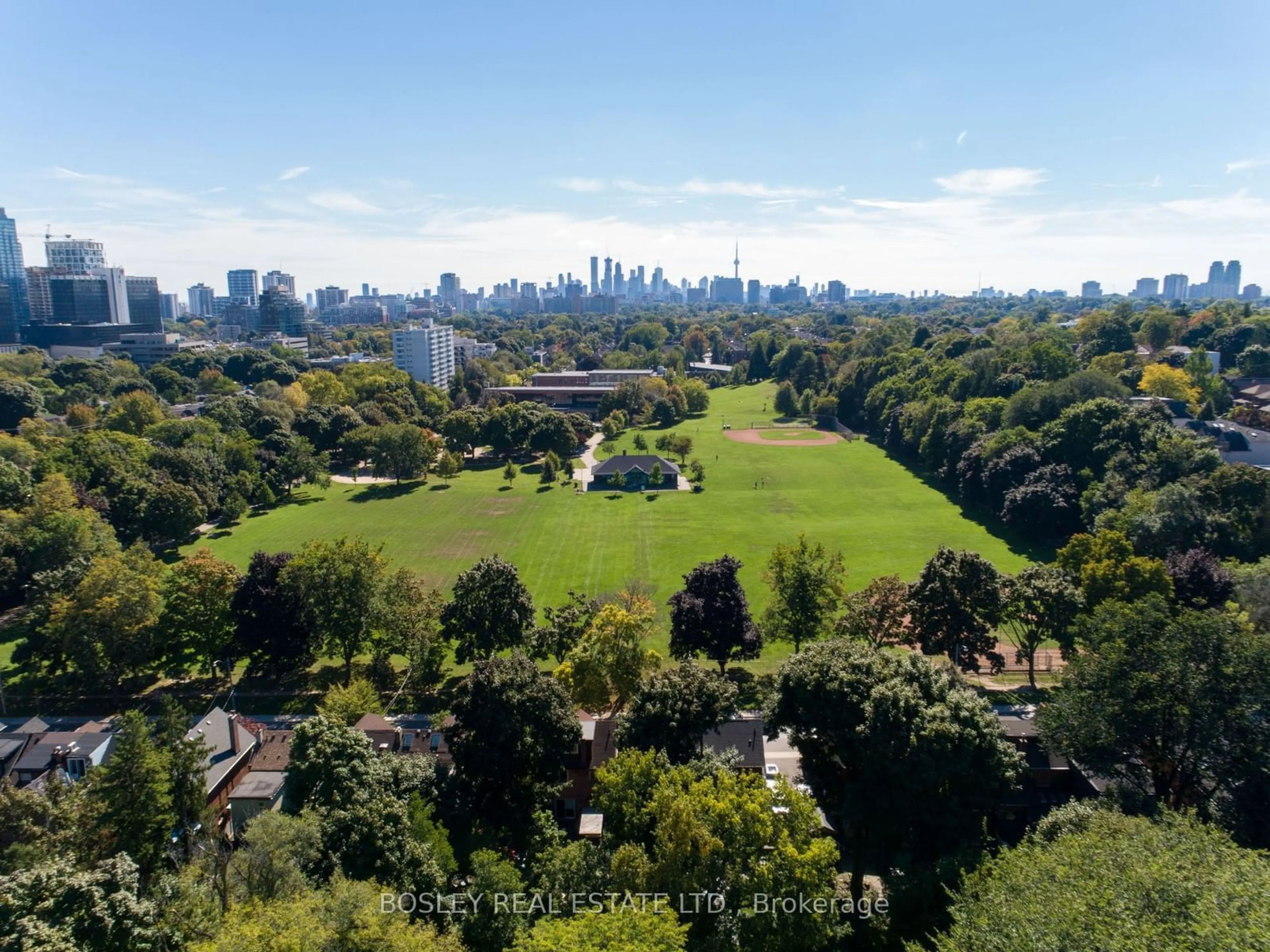 A pic from outside/outdoor area/front of a property/back of a property/a pic from drone, city buildings view from balcony for 224 Roselawn Ave, Toronto Ontario M4R 1E9