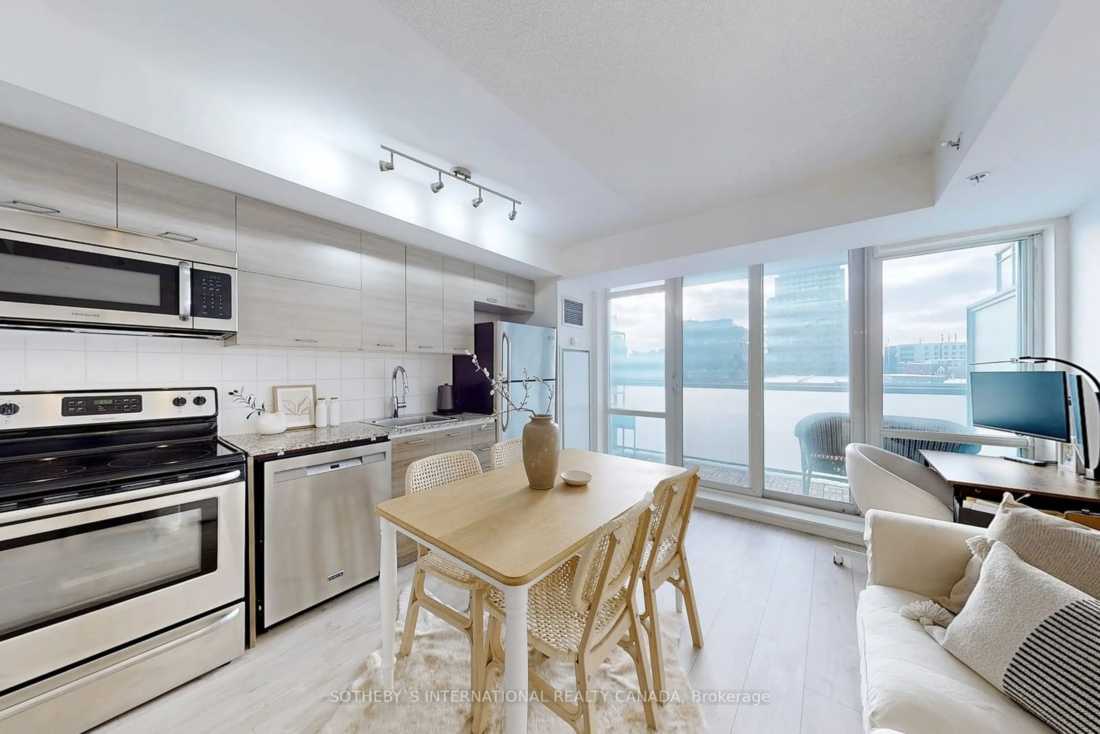 Open concept kitchen, ceramic/tile floor for 20 Joe Shuster Way #415, Toronto Ontario M6K 0A3