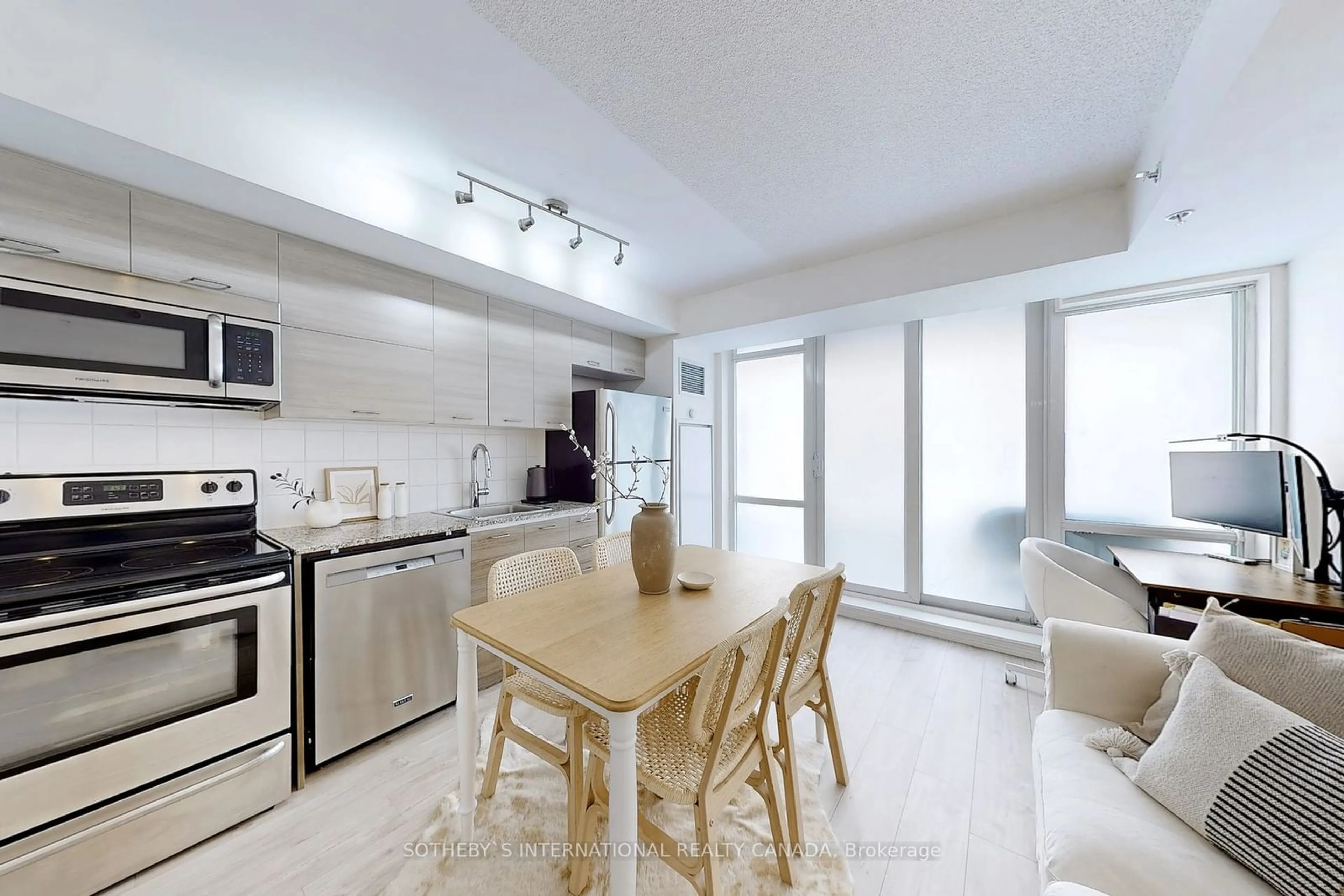 Open concept kitchen, unknown for 20 Joe Shuster Way #415, Toronto Ontario M6K 0A3