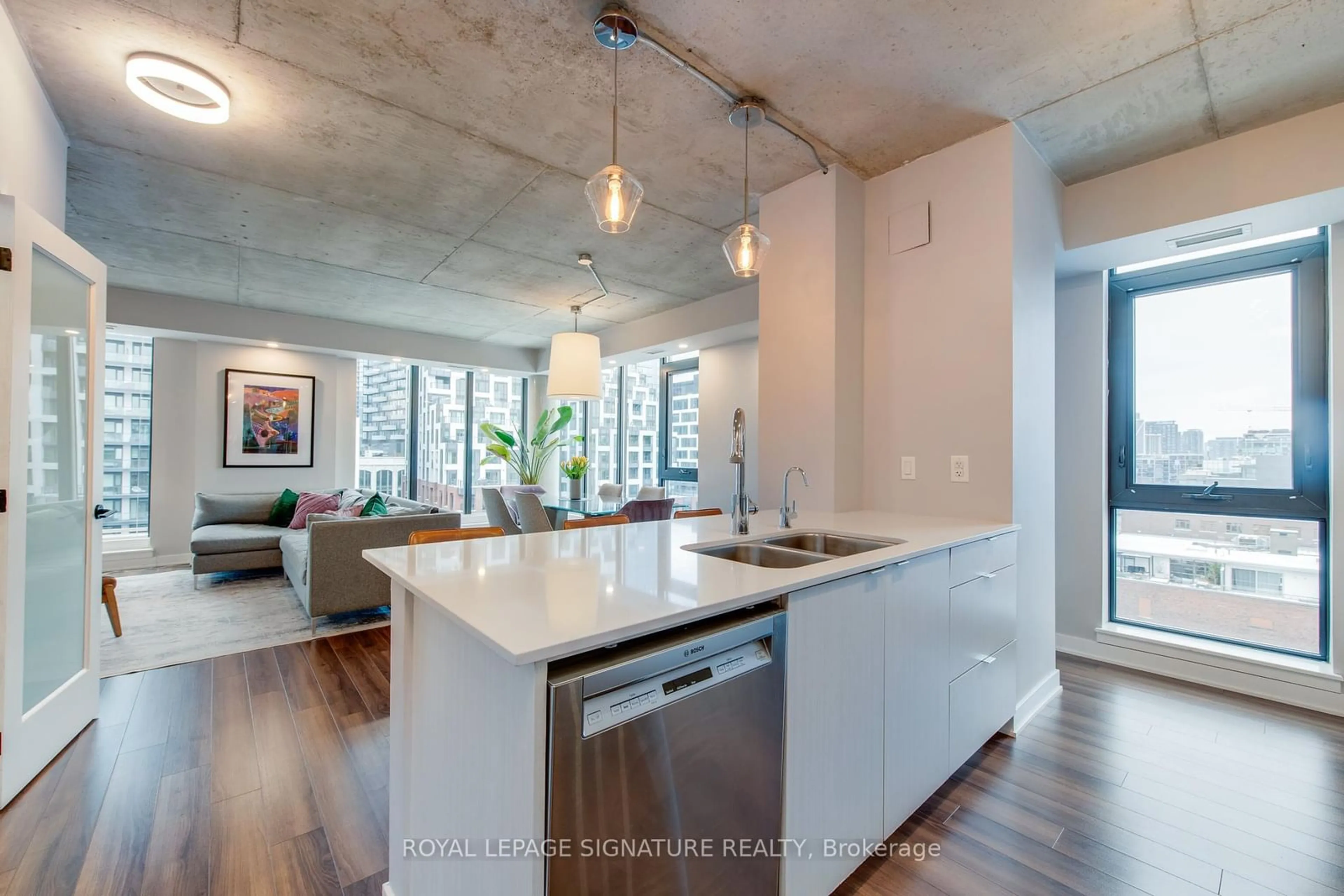 Open concept kitchen, cement floor for 400 Wellington St #PH1106, Toronto Ontario M5V 0B5