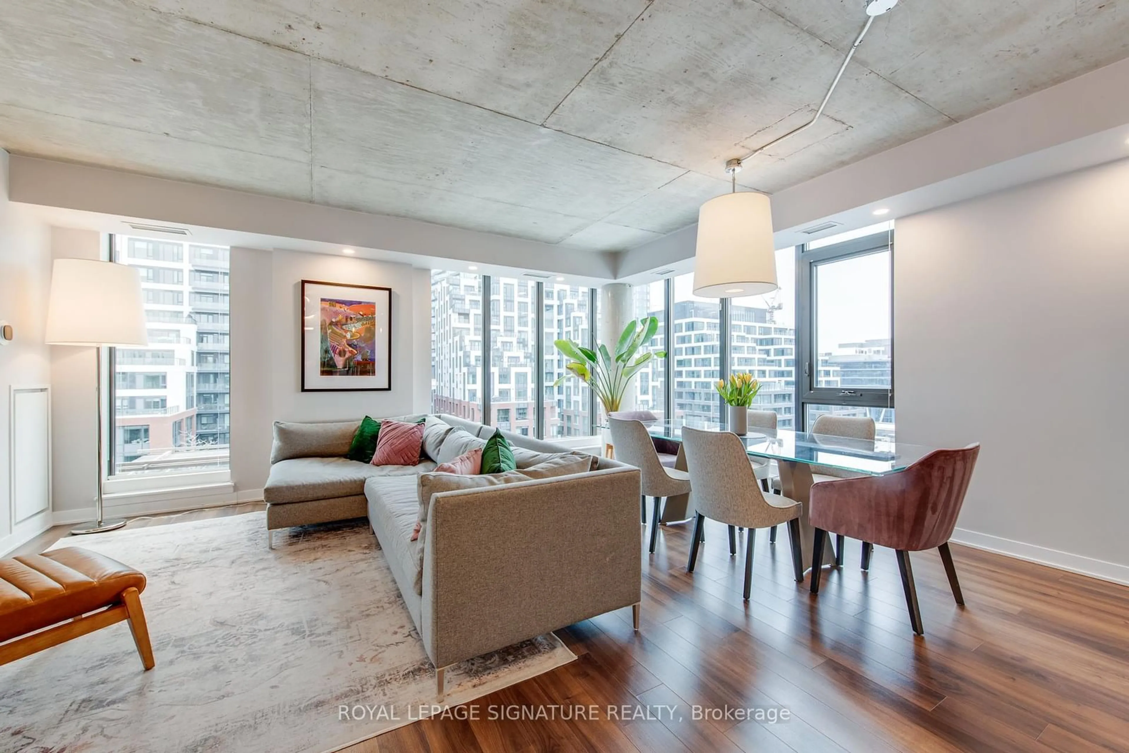 Living room with furniture, cement floor for 400 Wellington St #PH1106, Toronto Ontario M5V 0B5