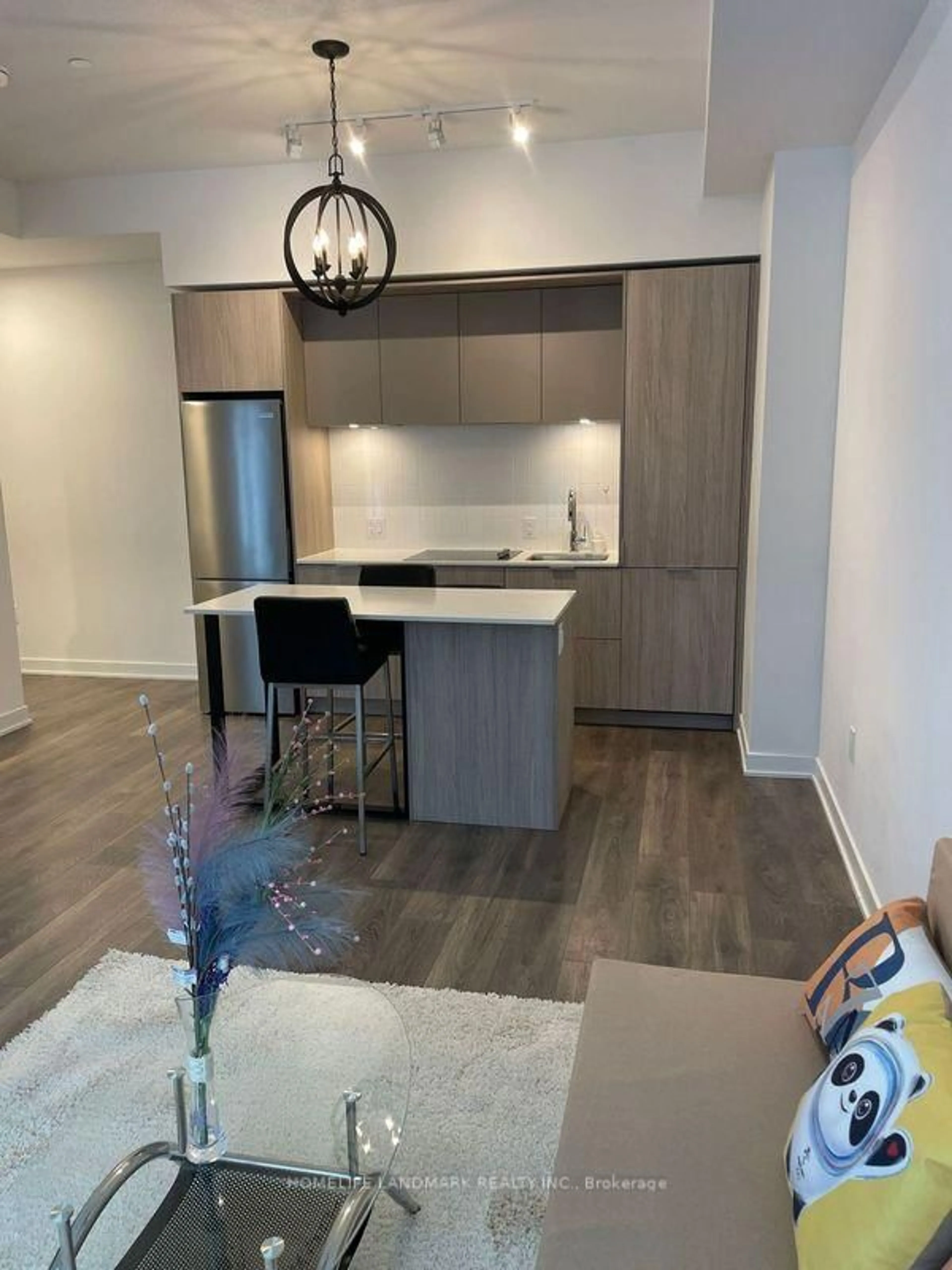 Open concept kitchen, wood/laminate floor for 35 Tubman Ave #318, Toronto Ontario M5A 0T1