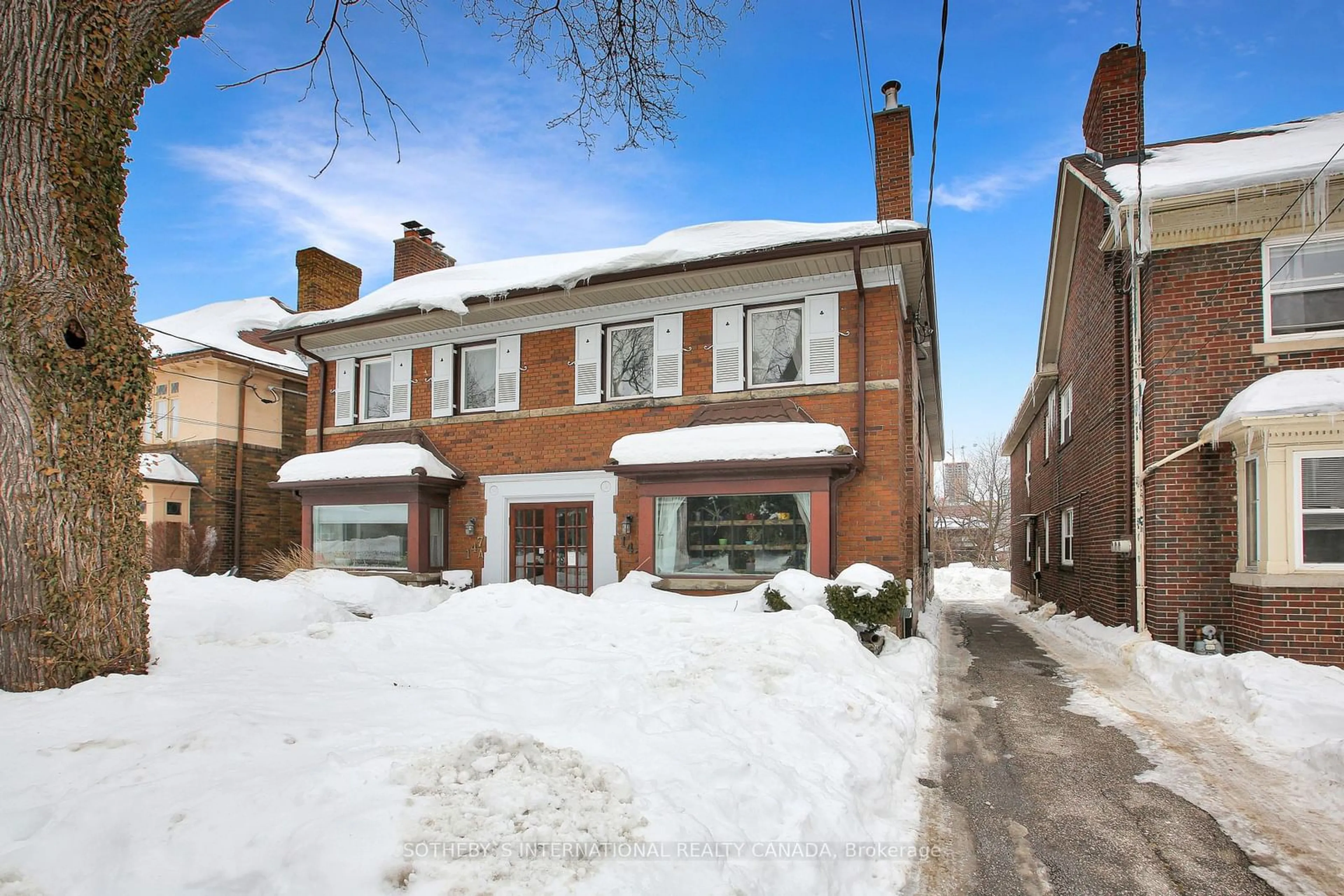 Home with brick exterior material, street for 147 Highbourne Rd, Toronto Ontario M5P 2J8