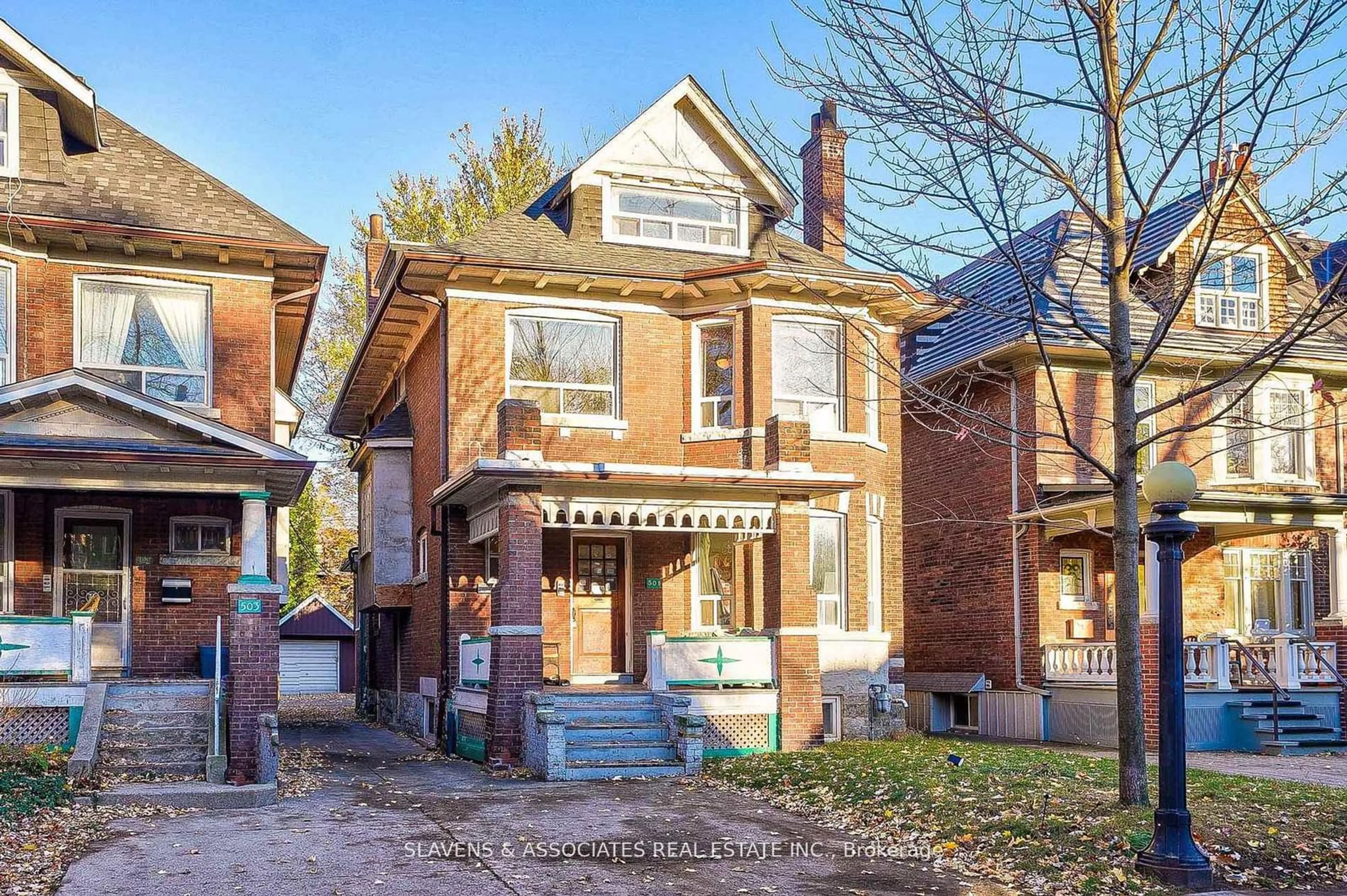 Home with brick exterior material, street for 501 Palmerston Blvd, Toronto Ontario M6G 2P2