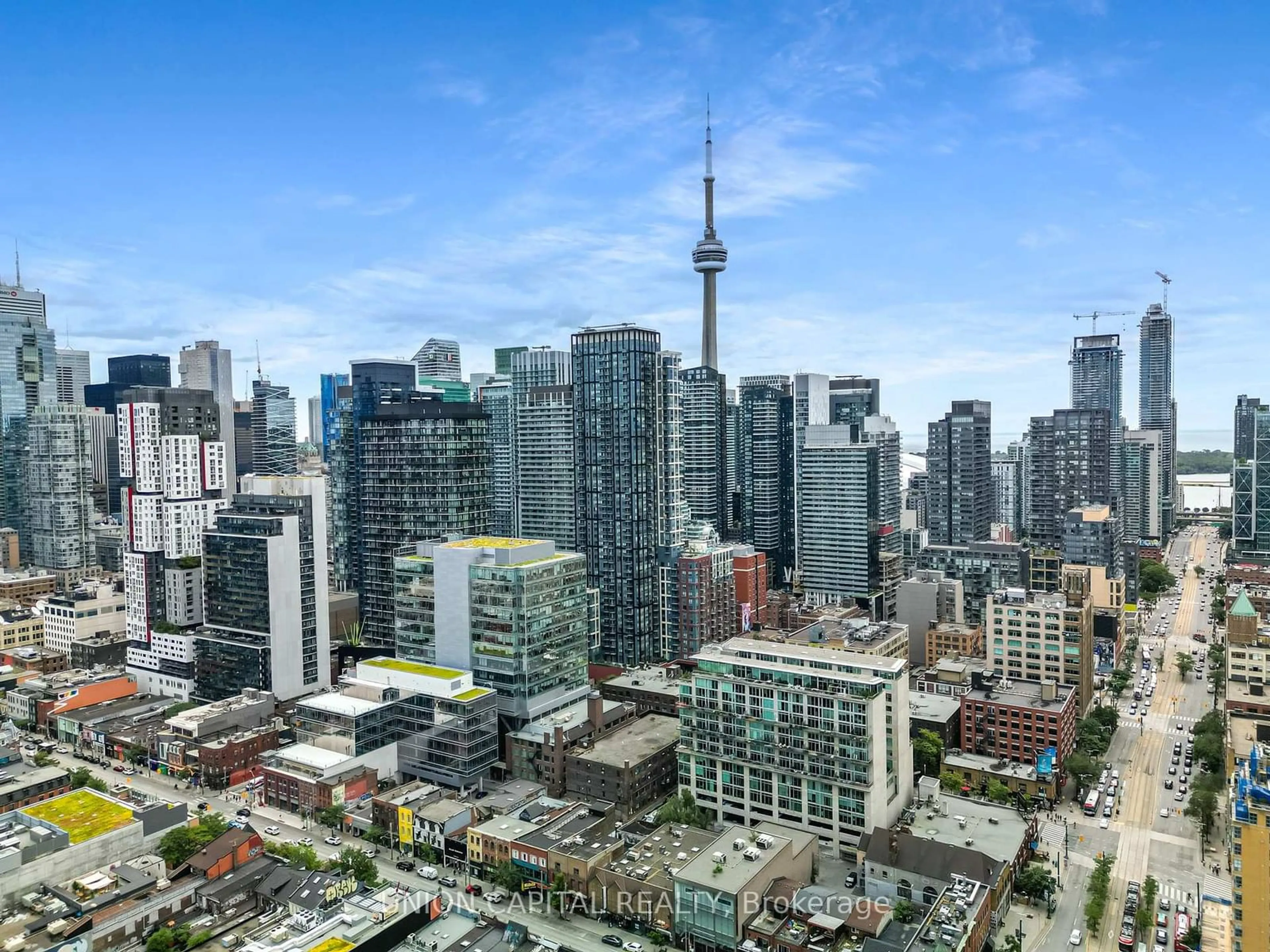 A pic from outside/outdoor area/front of a property/back of a property/a pic from drone, city buildings view from balcony for 108 Peter St #301, Toronto Ontario M5V 0W2