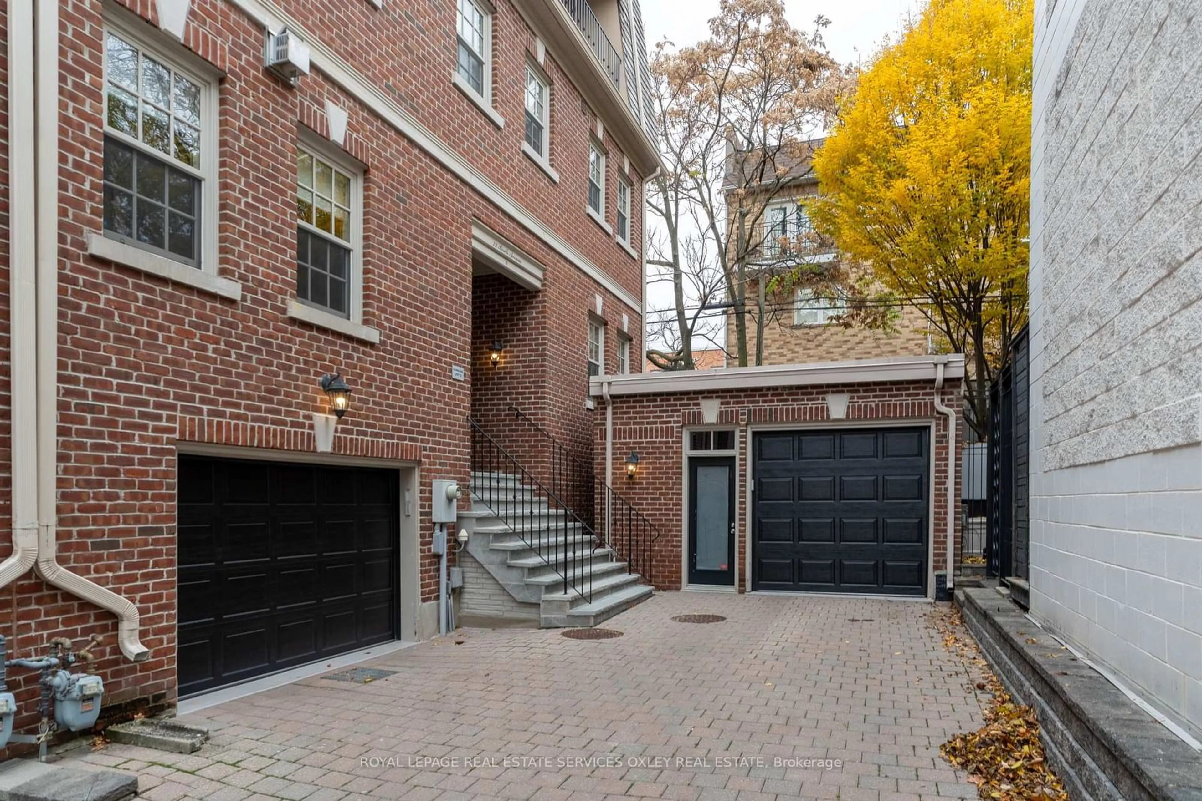 Home with brick exterior material, street for 22 Birch Ave #Th D, Toronto Ontario M4V 1C8