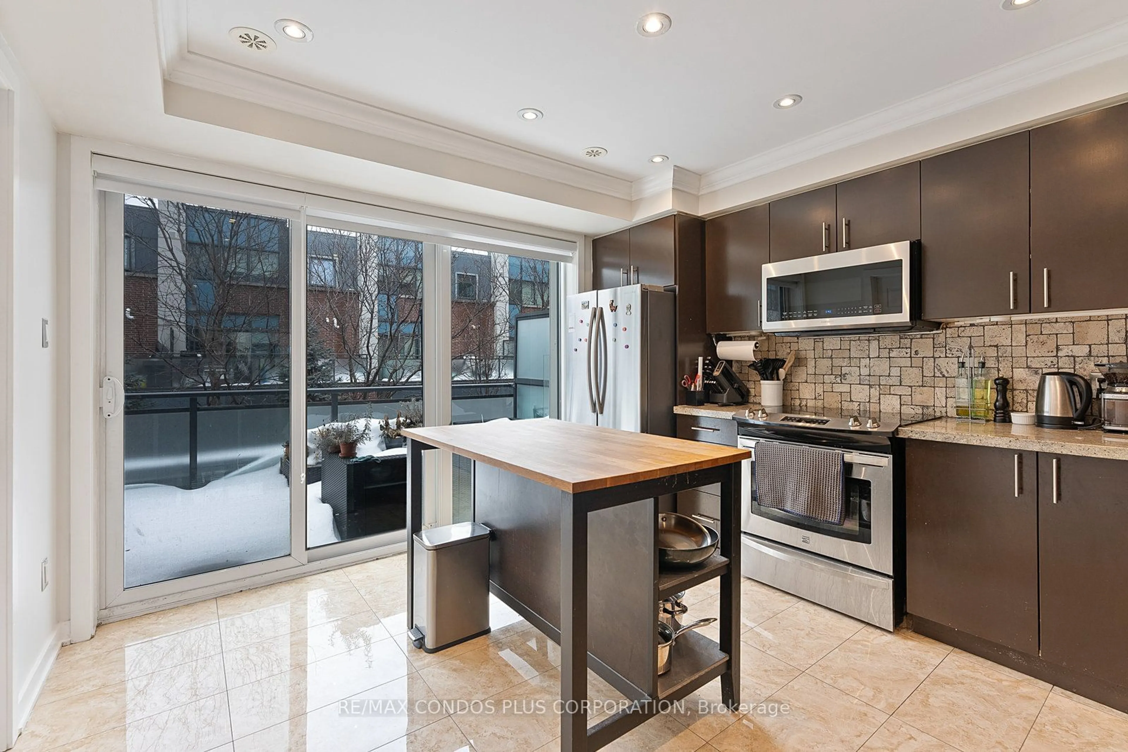 Contemporary kitchen, ceramic/tile floor for 50 Cole St, Toronto Ontario M5A 0A3