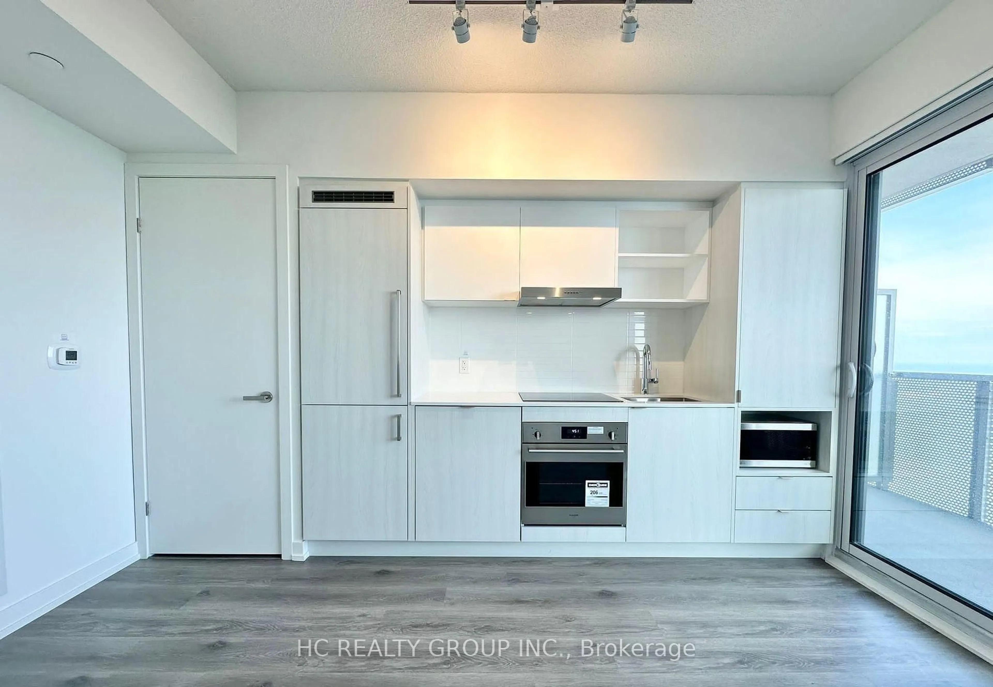 Open concept kitchen, wood/laminate floor for 138 Downes Street #4610, Toronto Ontario M5E 0E4