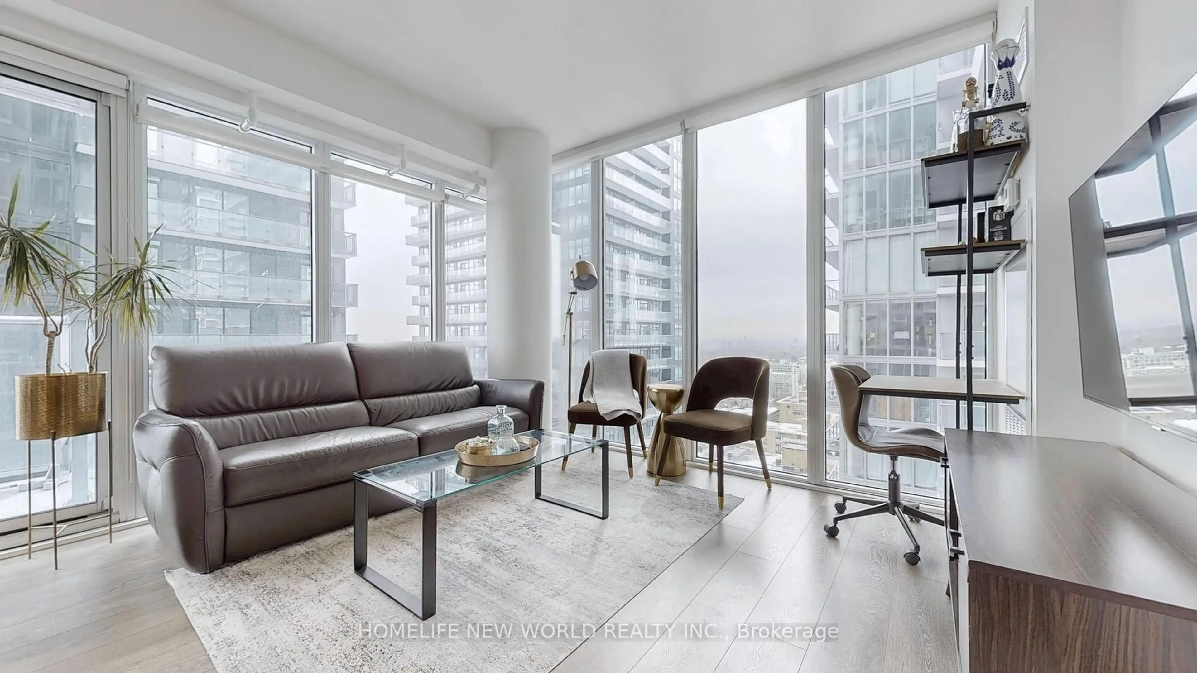 Living room with furniture, unknown for 99 Broadway Ave #2404, Toronto Ontario M4P 0E3