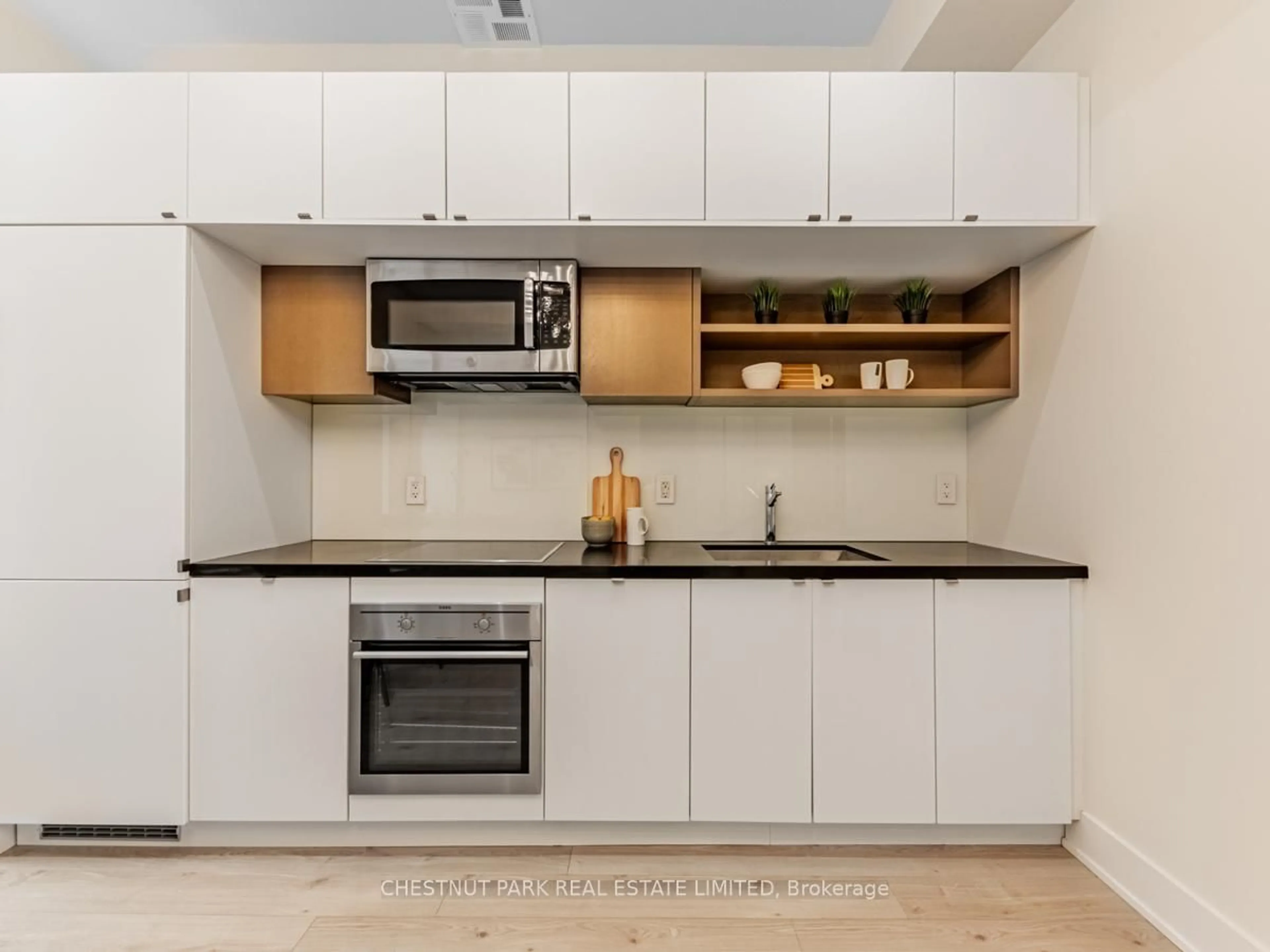 Standard kitchen, wood/laminate floor for 111 St Clair Ave #420, Toronto Ontario M4V 1N5