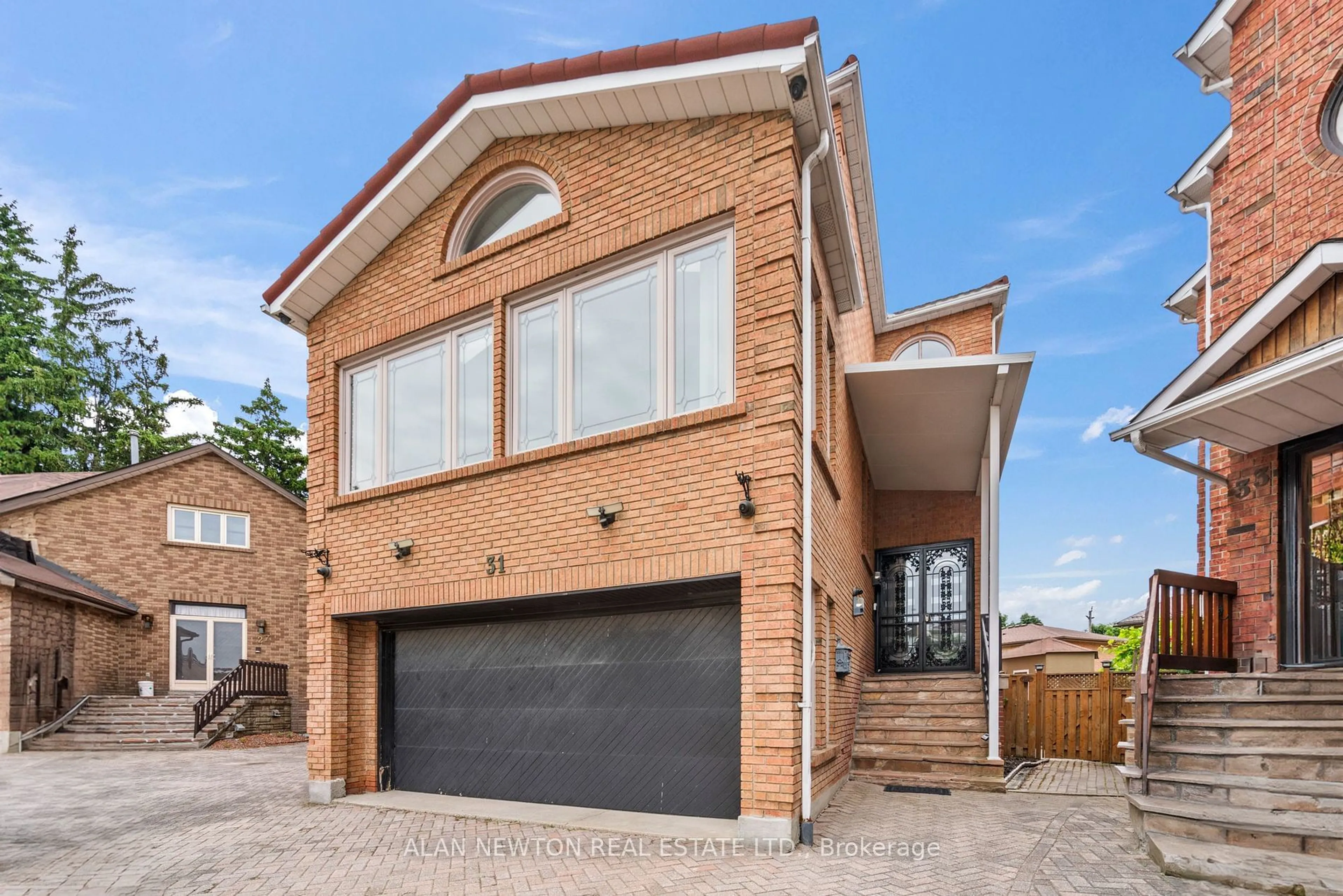 Home with brick exterior material, street for 31 Carnival Crt, Toronto Ontario M2R 3T7