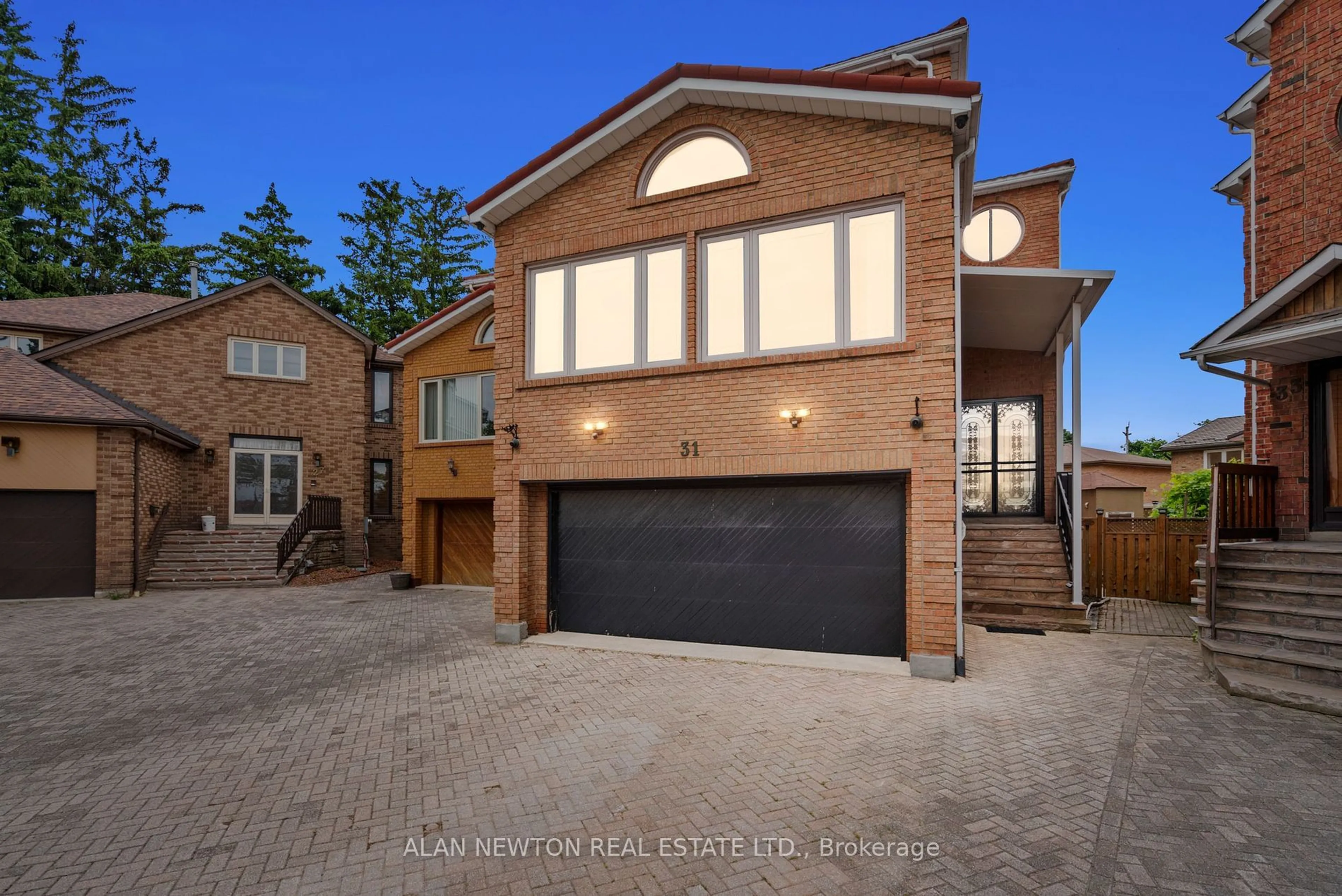 Home with brick exterior material, street for 31 Carnival Crt, Toronto Ontario M2R 3T7