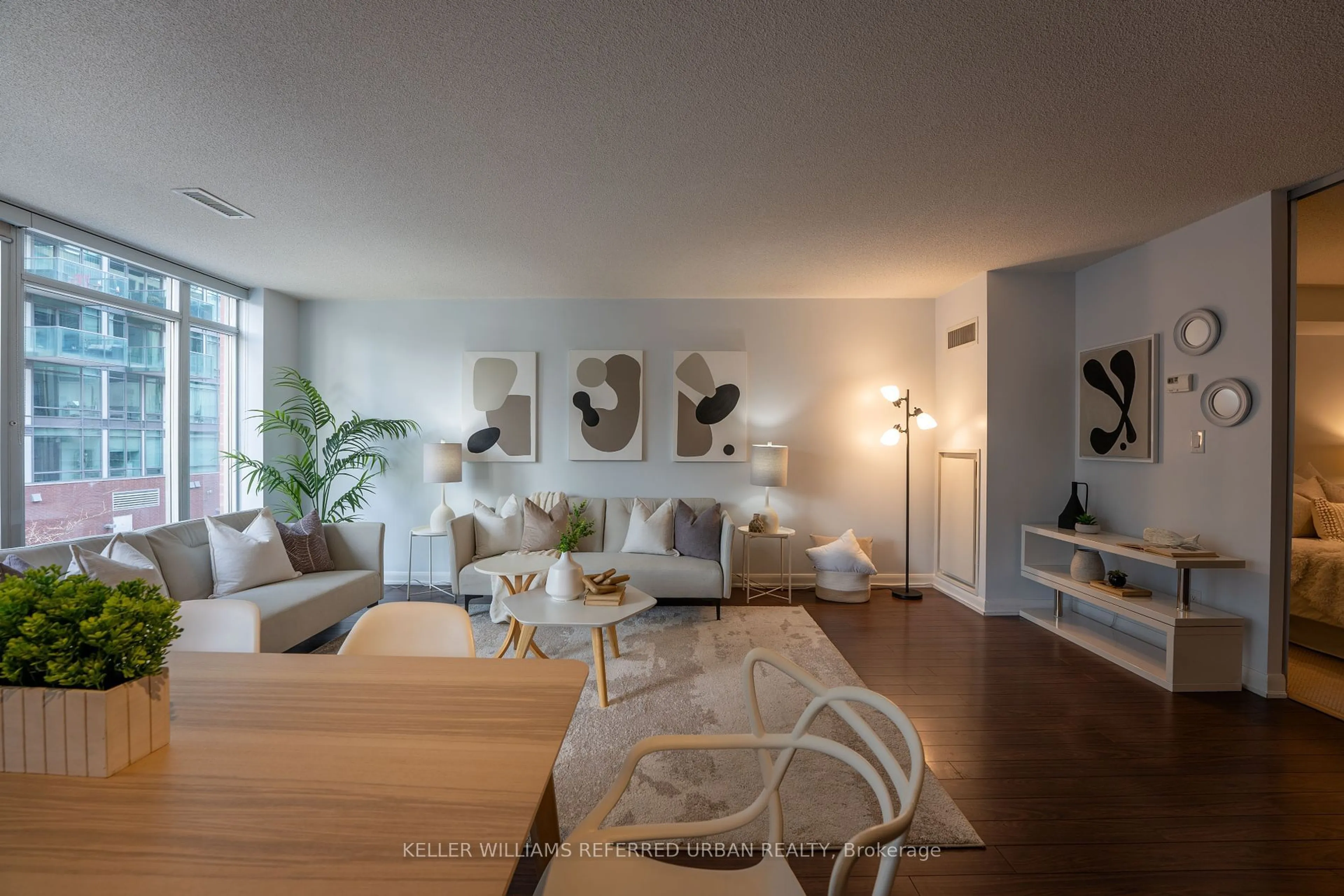 Living room with furniture, wood/laminate floor for 205 Frederick St #311, Toronto Ontario M5A 4V3