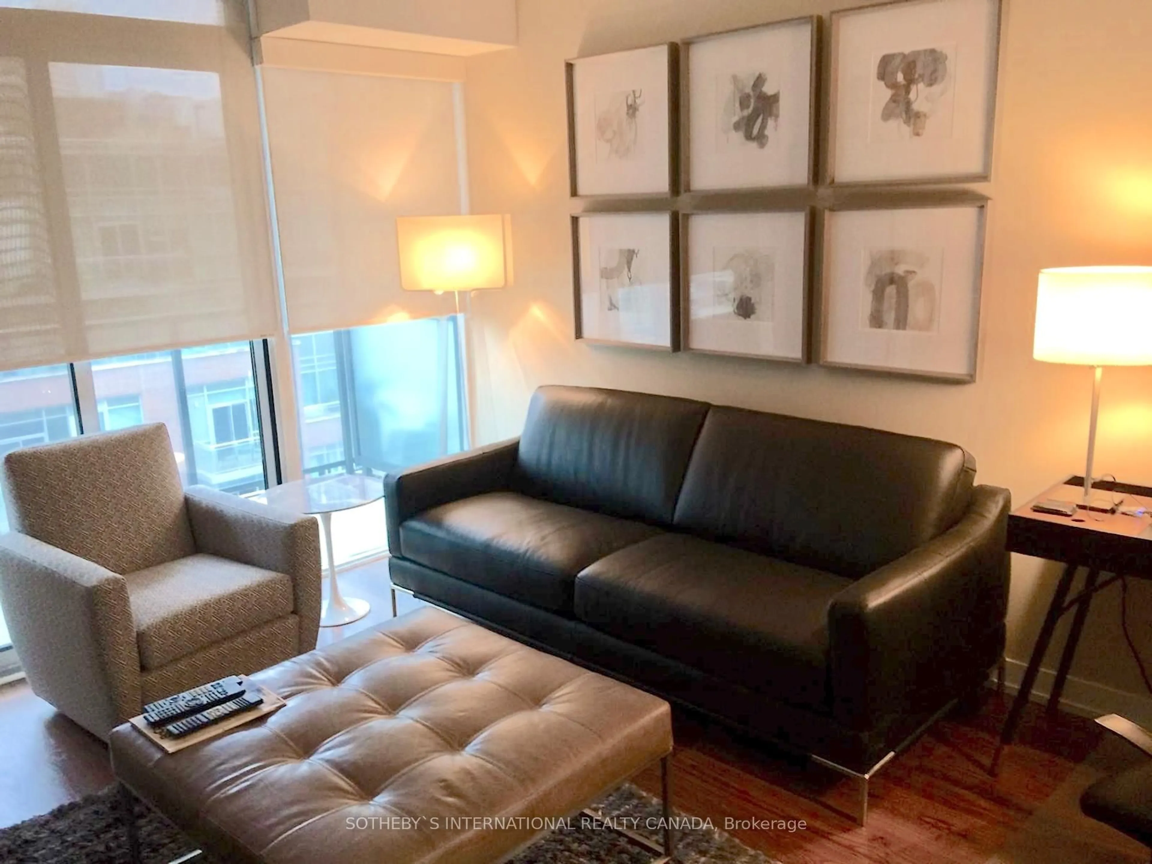 Living room with furniture, wood/laminate floor for 105 George St #812, Toronto Ontario M5A 0L4