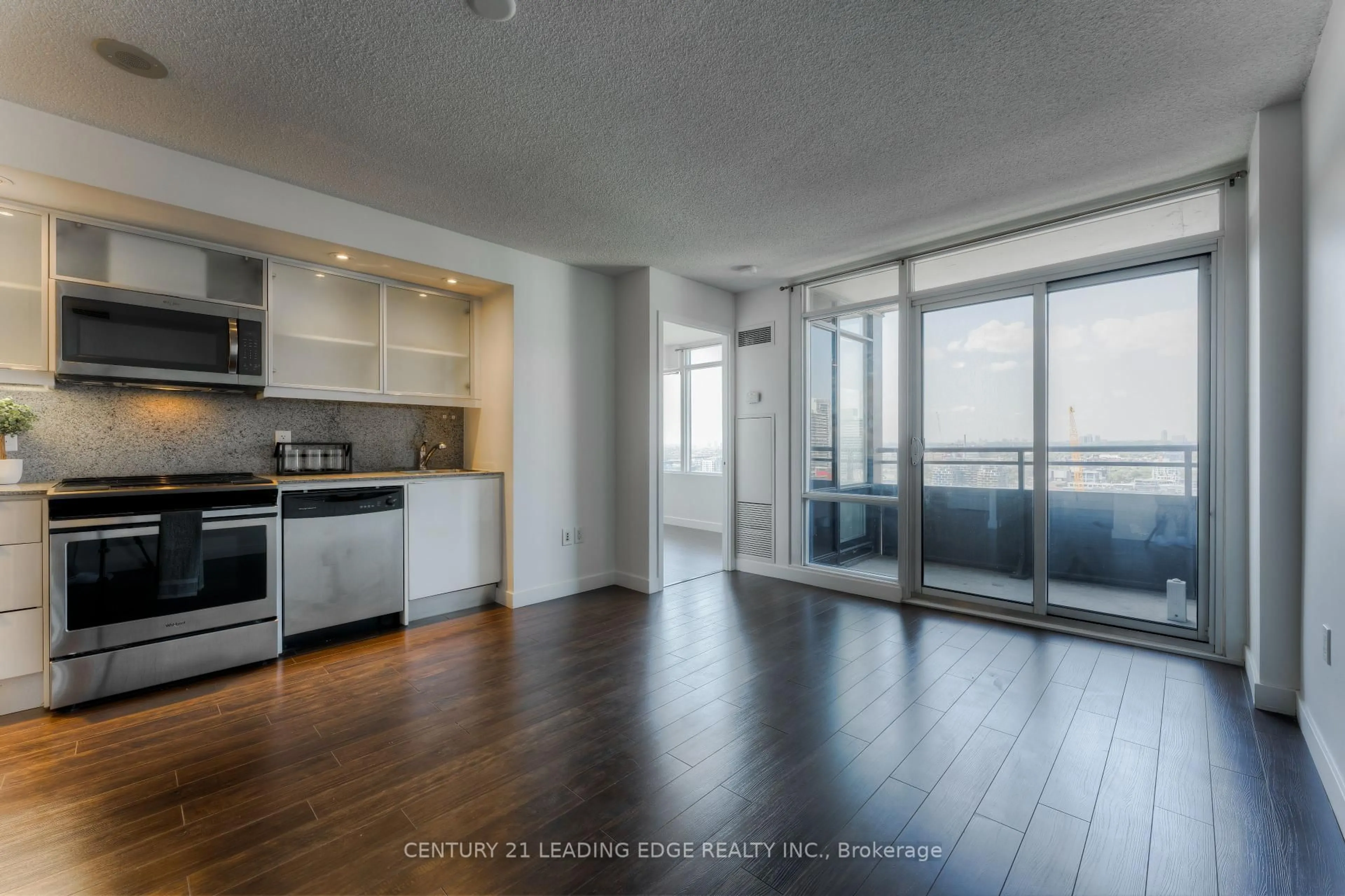 Open concept kitchen, wood/laminate floor for 25 TELEGRAM Mews #3111, Toronto Ontario M5V 3Z1