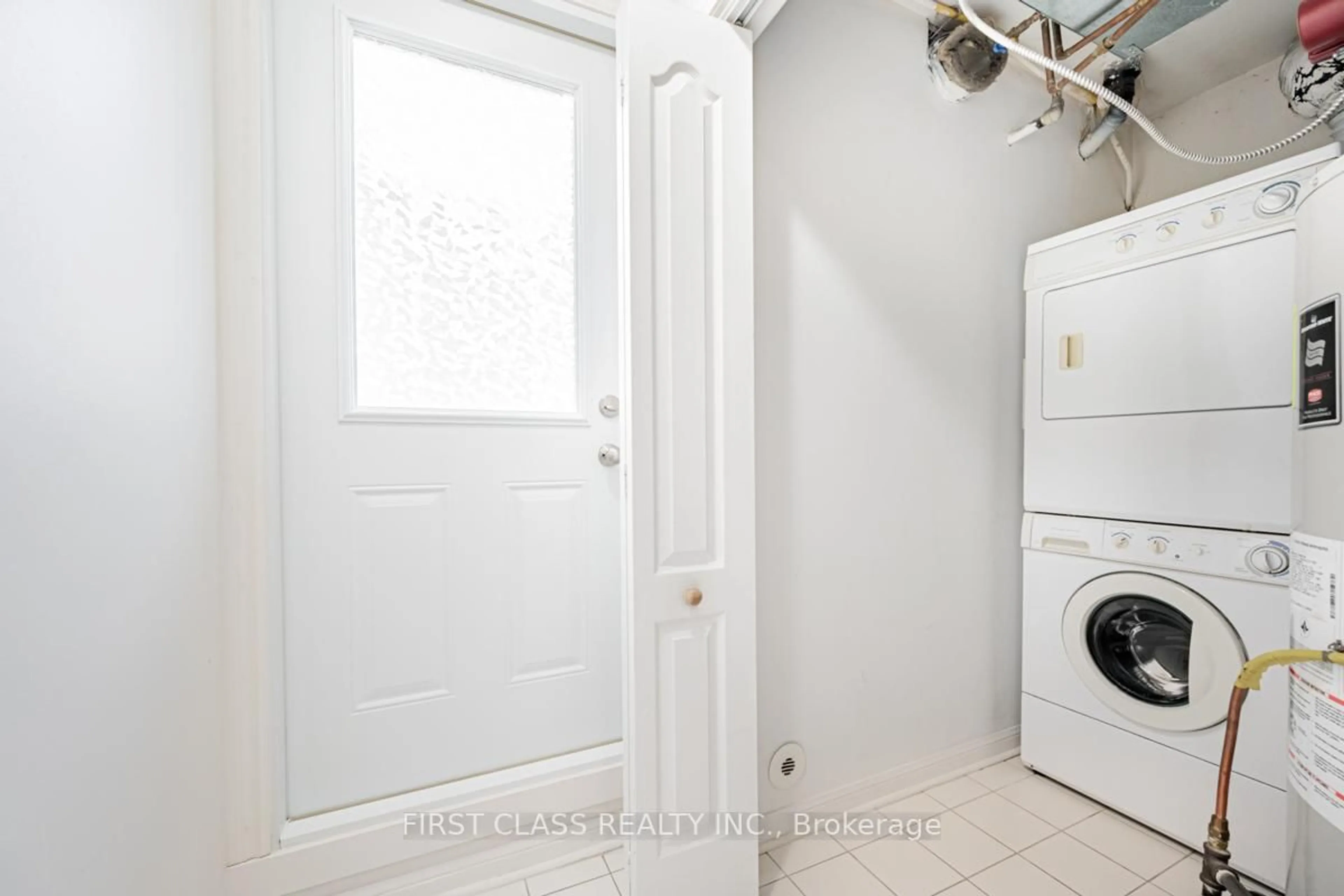 Laundry room for 78 Carr St #25, Toronto Ontario M5T 1B7