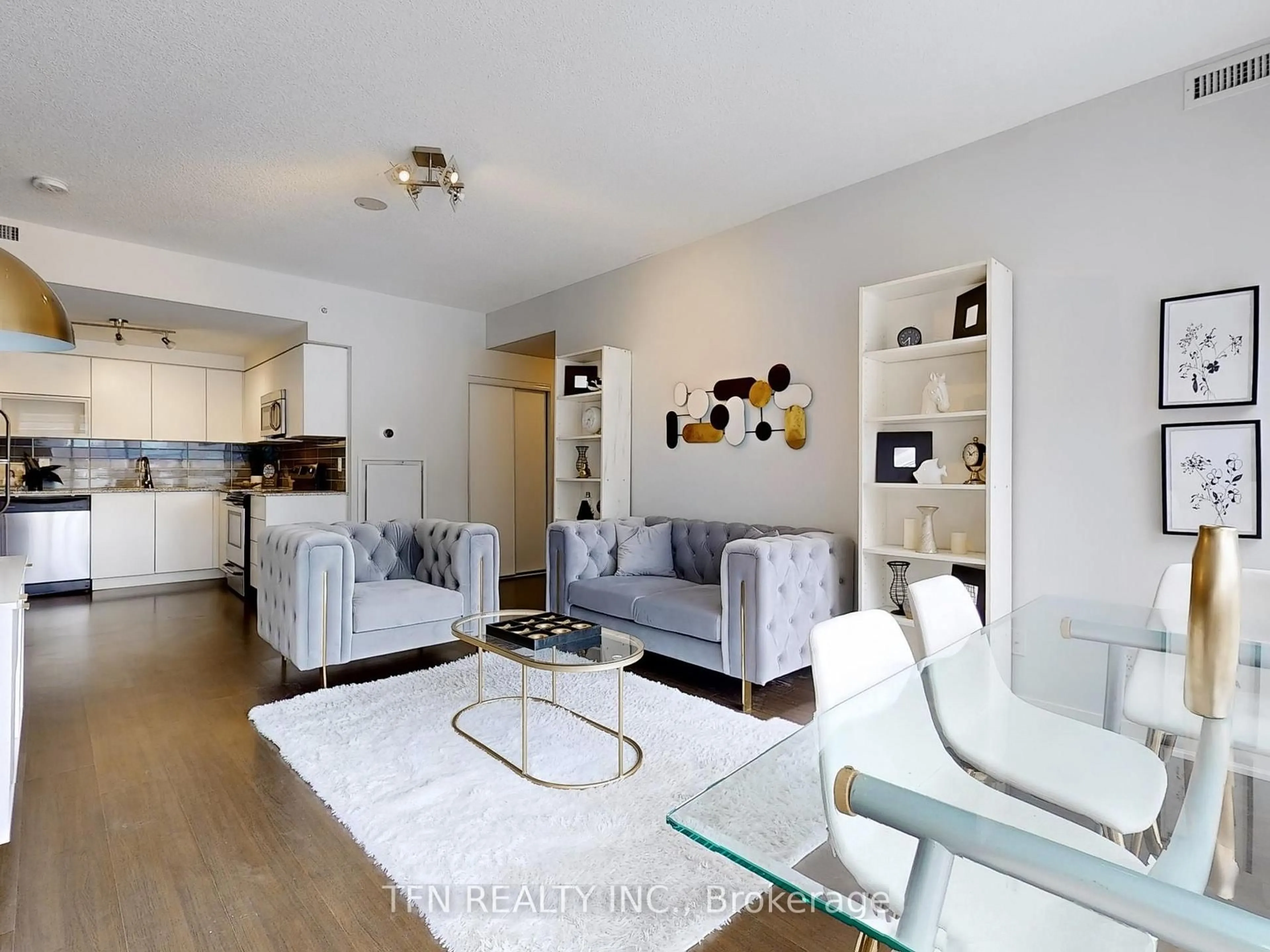 Living room with furniture, wood/laminate floor for 69 Lynn Williams St #204, Toronto Ontario M6K 3R7