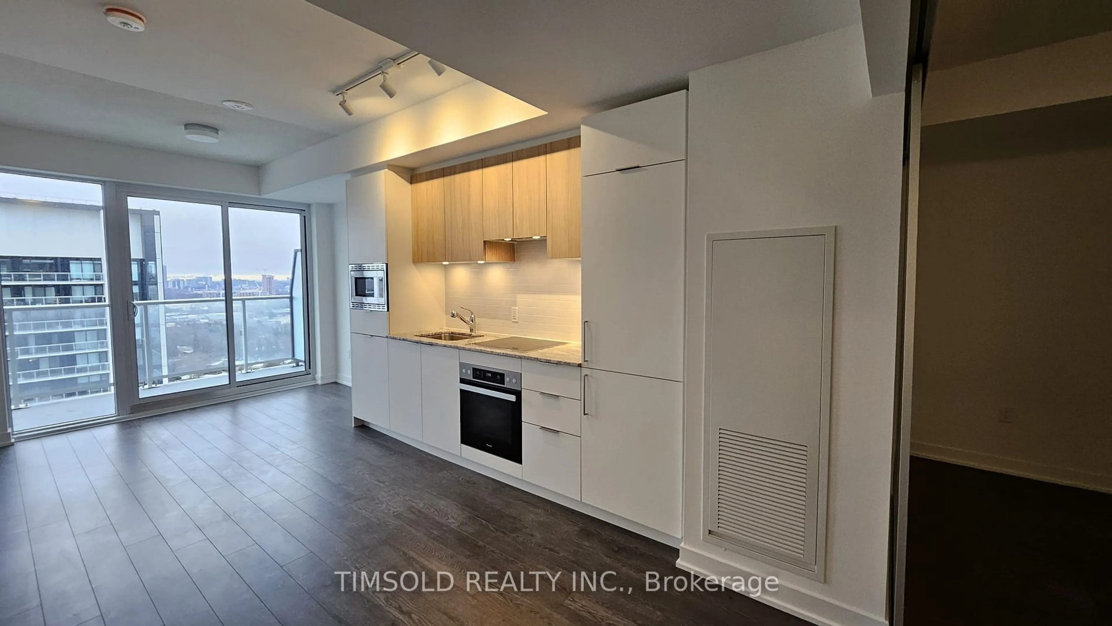 Open concept kitchen, wood/laminate floor for 50 O'Neill Rd #1601, Toronto Ontario M3C 0R1