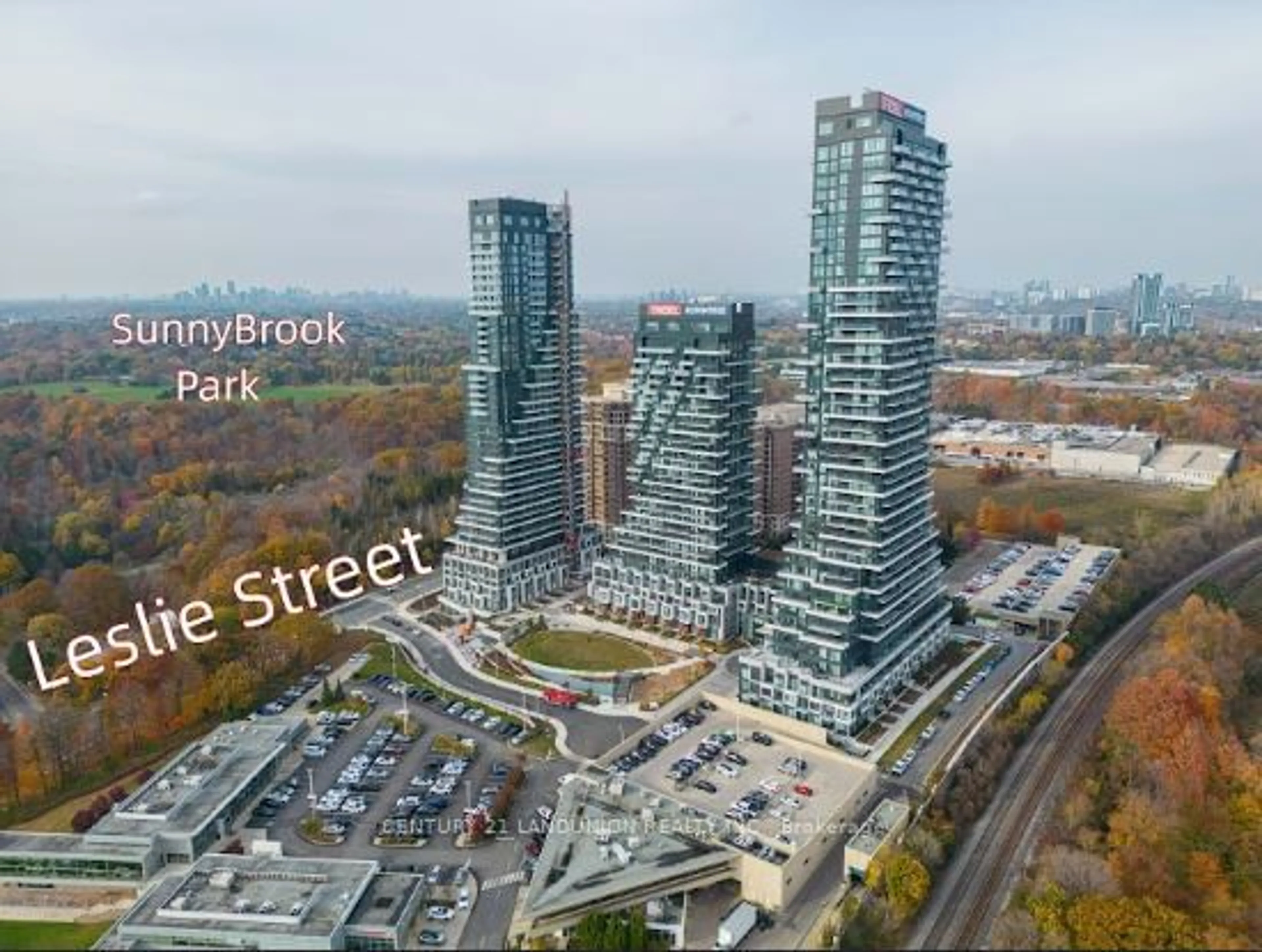 A pic from outside/outdoor area/front of a property/back of a property/a pic from drone, city buildings view from balcony for 30 Inn On The Park Dr #302, Toronto Ontario M3C 0P7