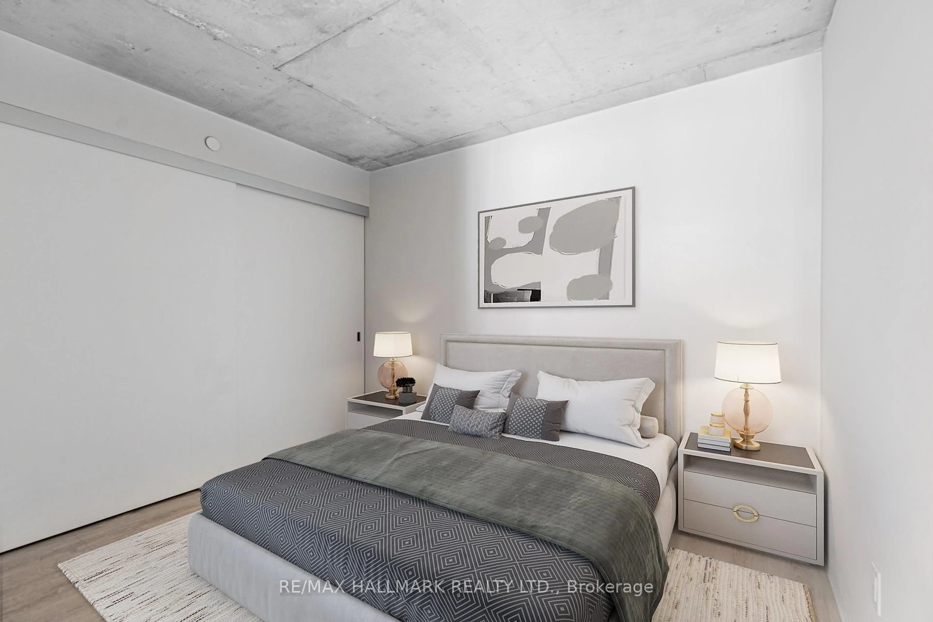 Bedroom with bed, cement floor for 5 Soudan Ave #707, Toronto Ontario M4S 0B1