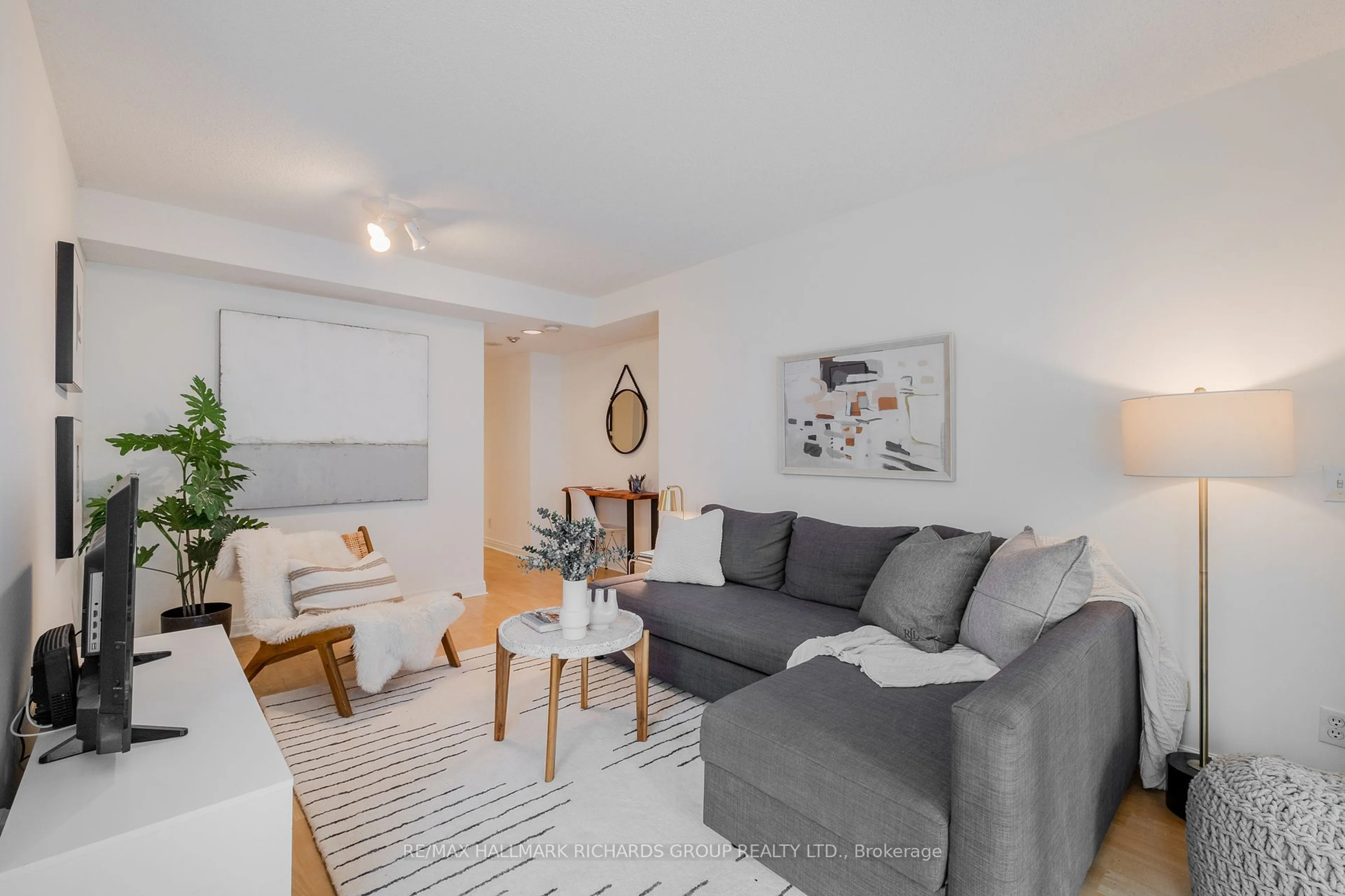 Living room with furniture, unknown for 50 Lombard St #804, Toronto Ontario M5C 2X4