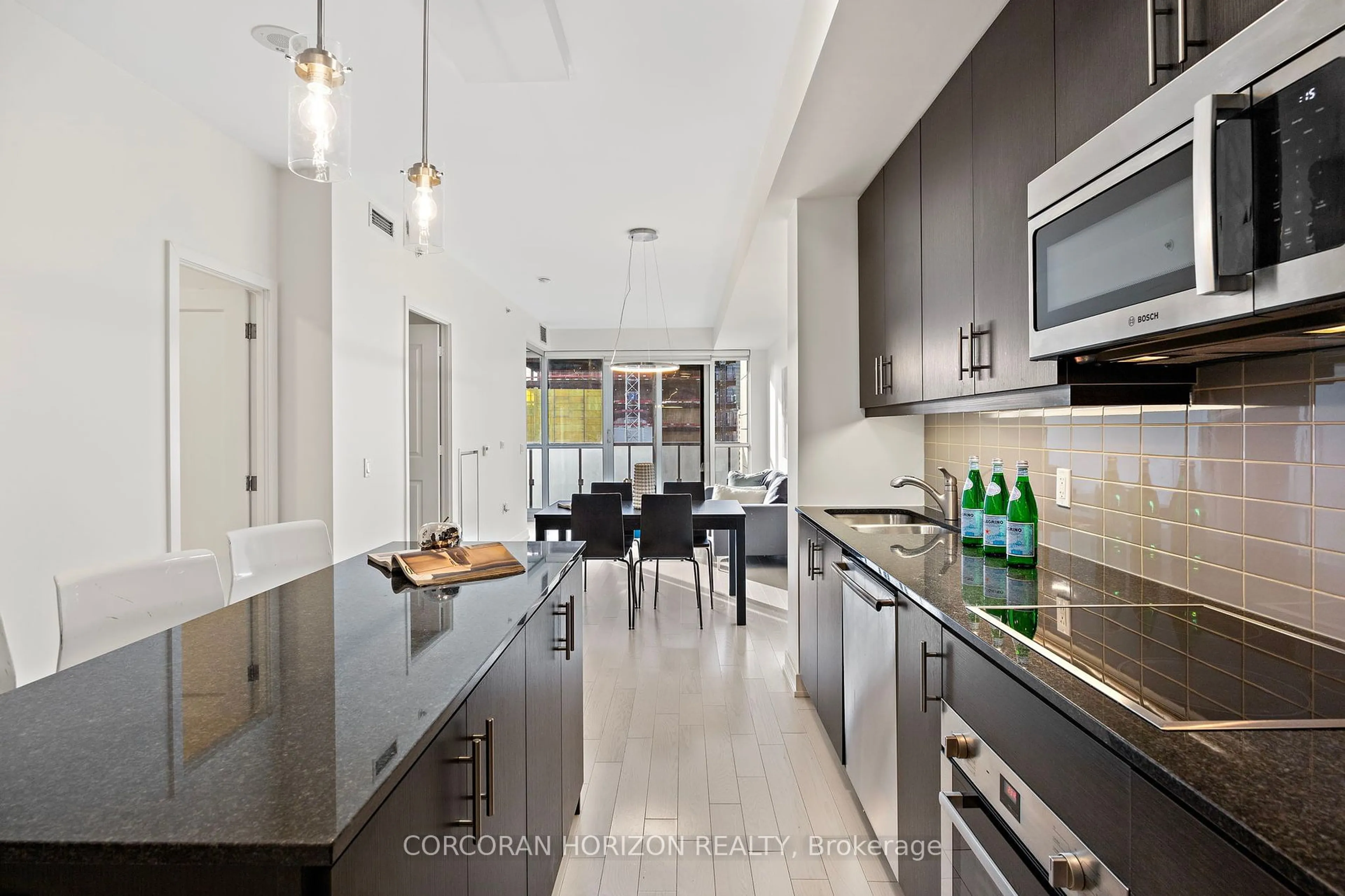 Open concept kitchen, ceramic/tile floor for 1 The Esplanade #1703, Toronto Ontario M5E 0A8