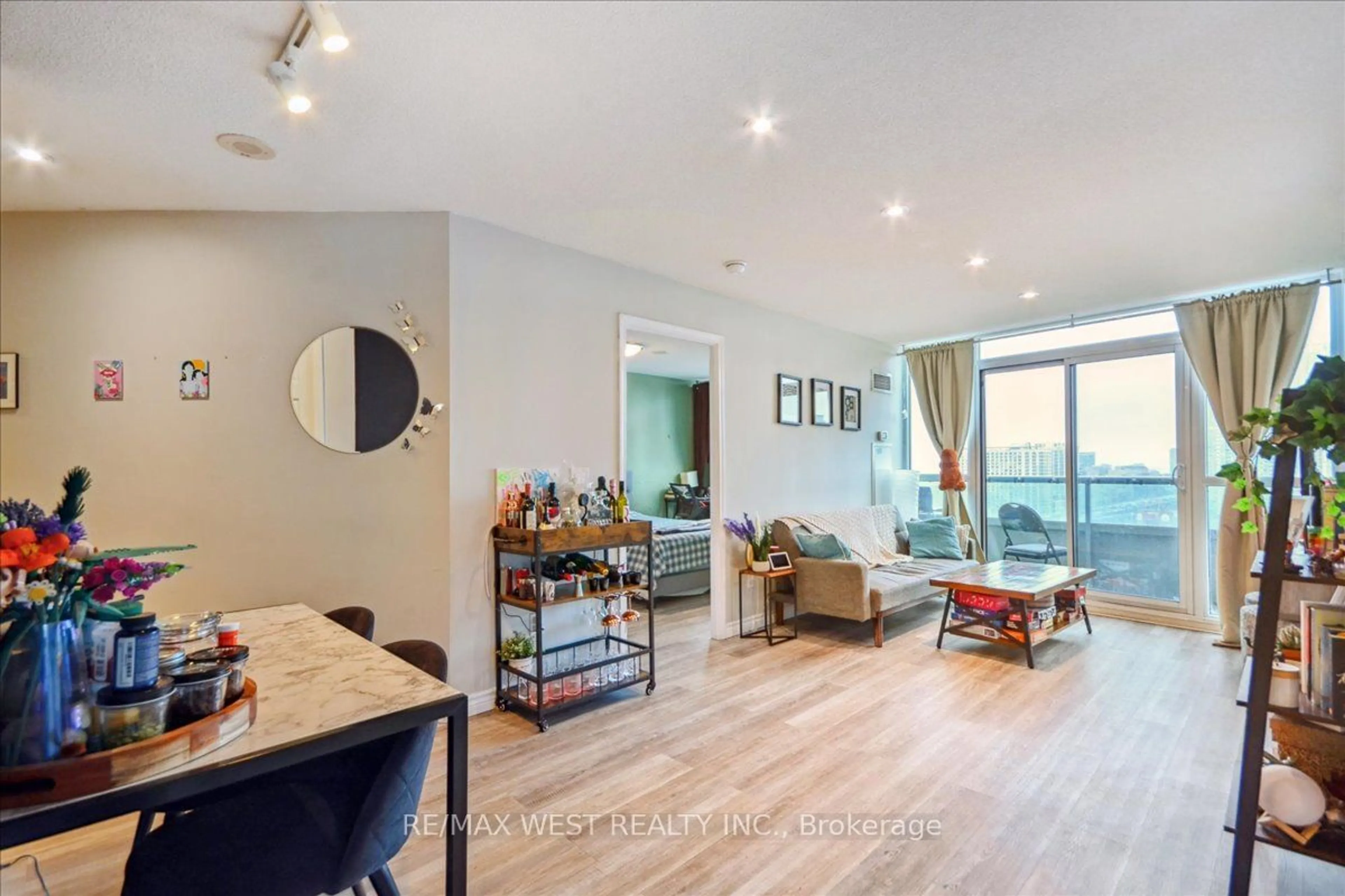 Living room with furniture, wood/laminate floor for 25 Lower Simcoe St #PH18, Toronto Ontario M5J 3A1