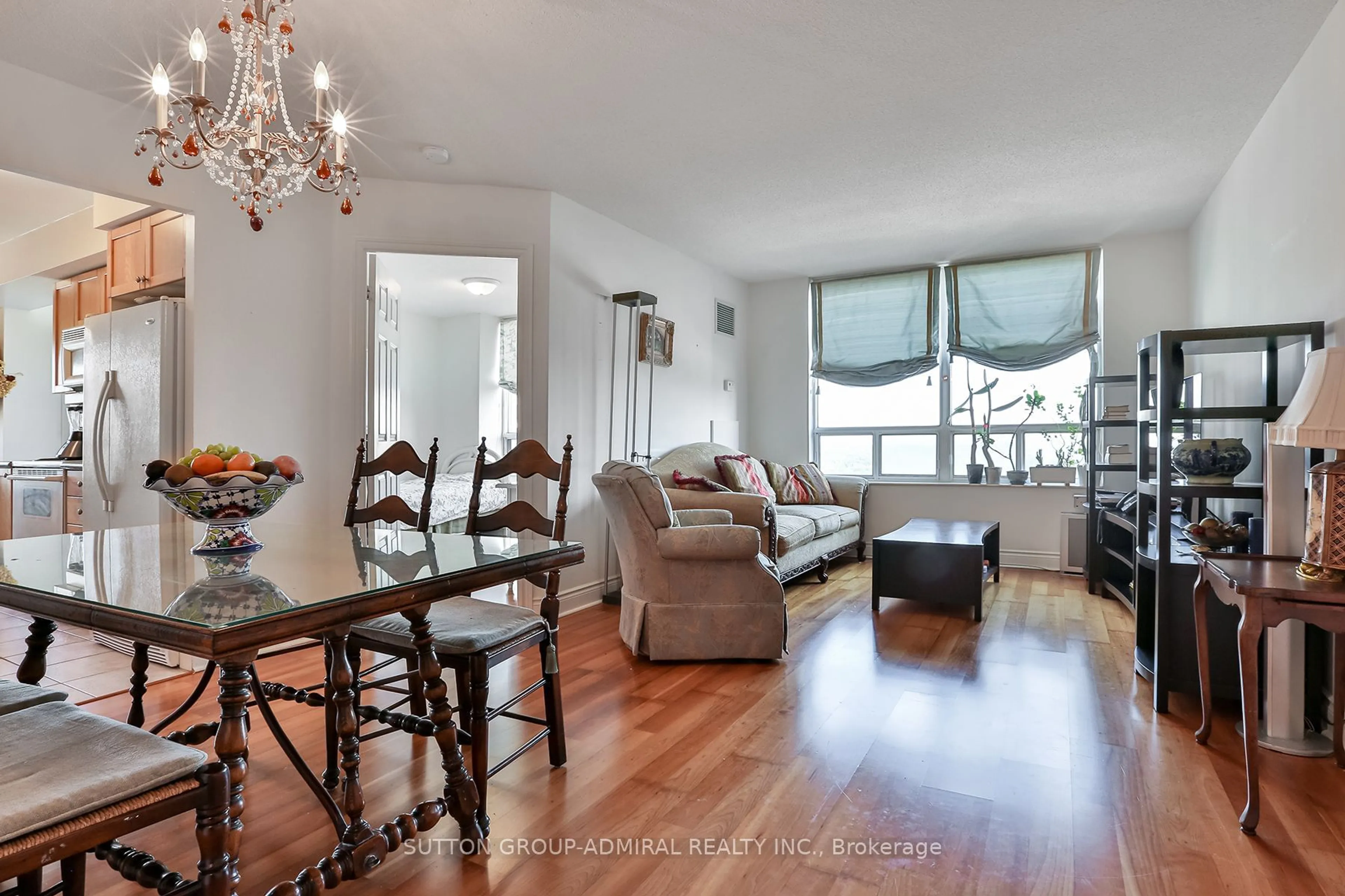 Living room with furniture, wood/laminate floor for 78 Harrison Garden Blvd #1403, Toronto Ontario M2N 7E2